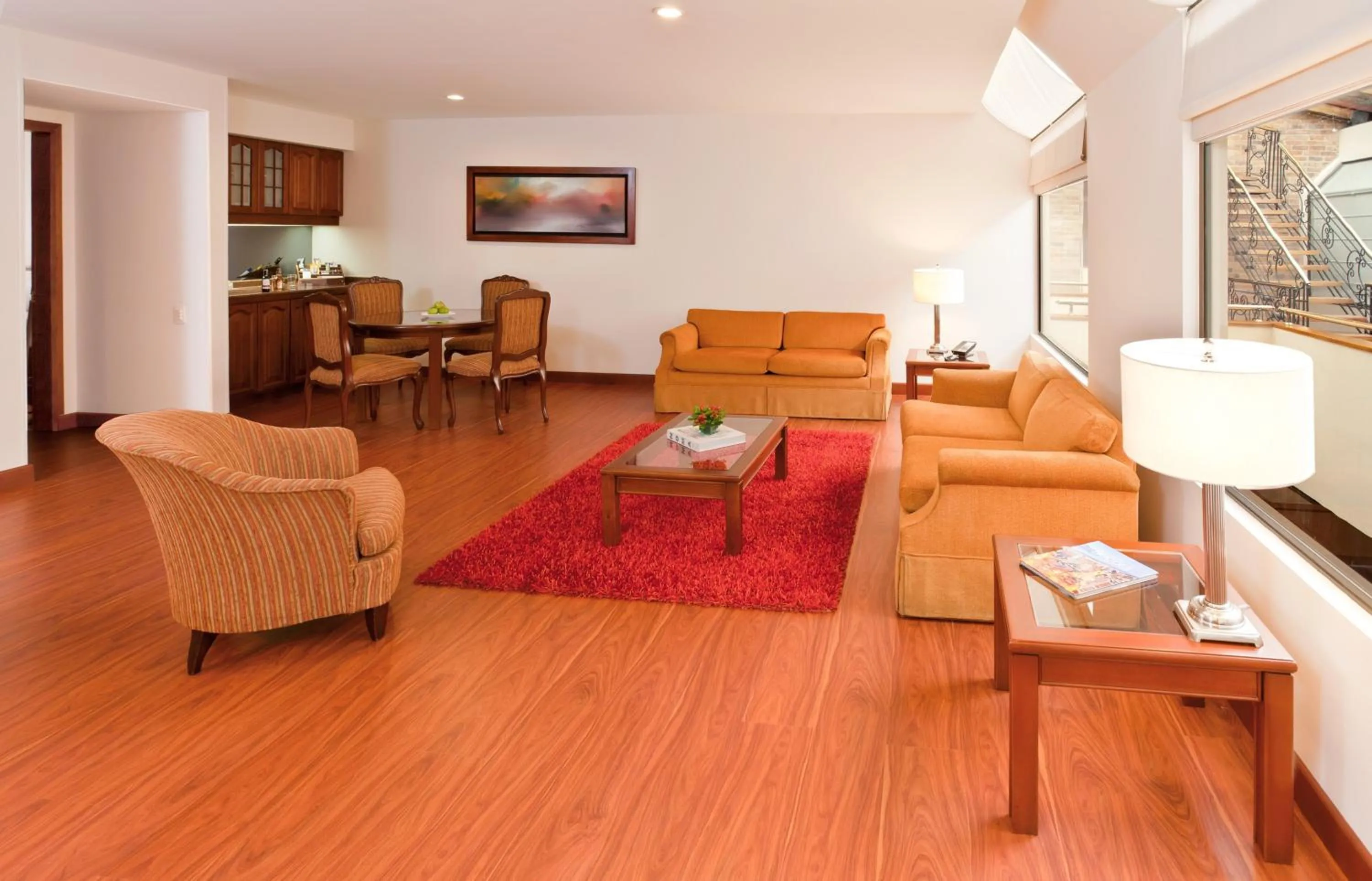 Seating area in Hotel Windsor House Inn By GEH Suites