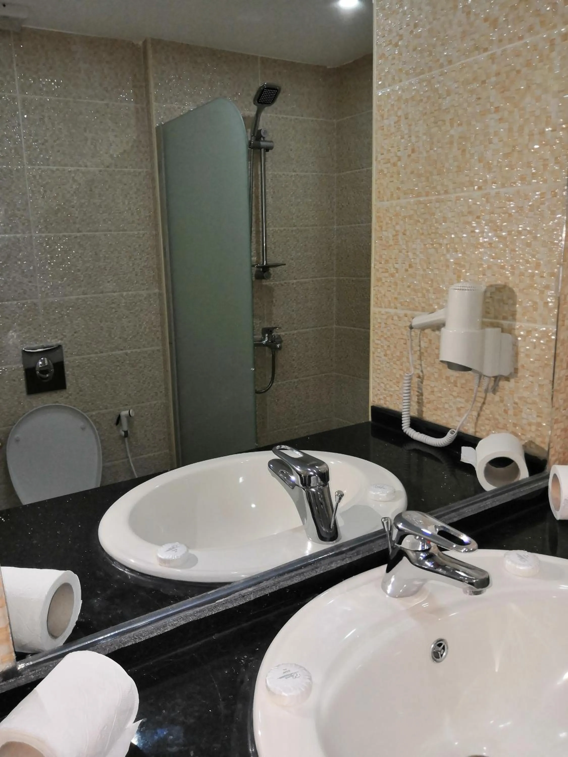 Shower in Sunset Hotel