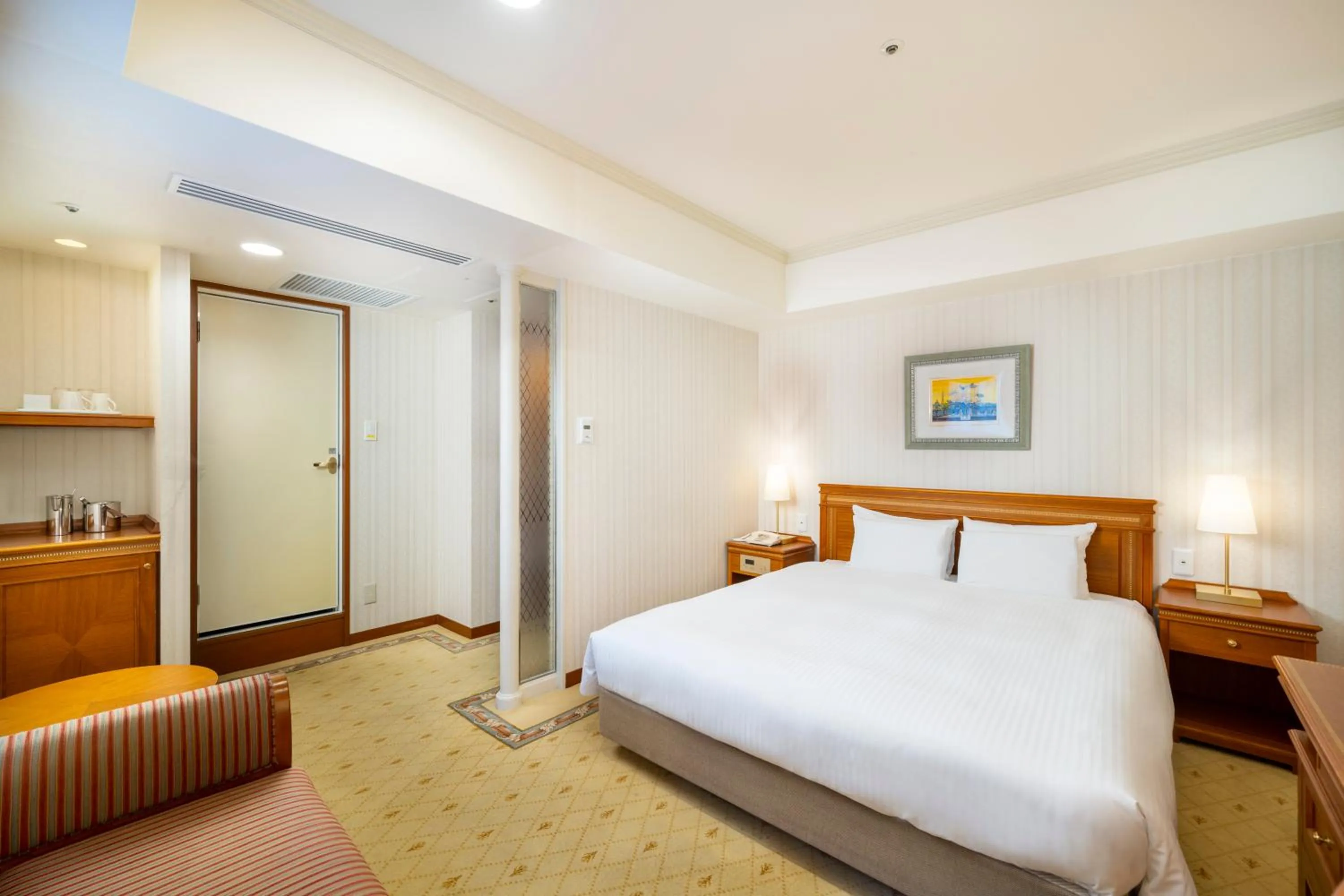 Bed in KOKO HOTEL Nagoya Sakae