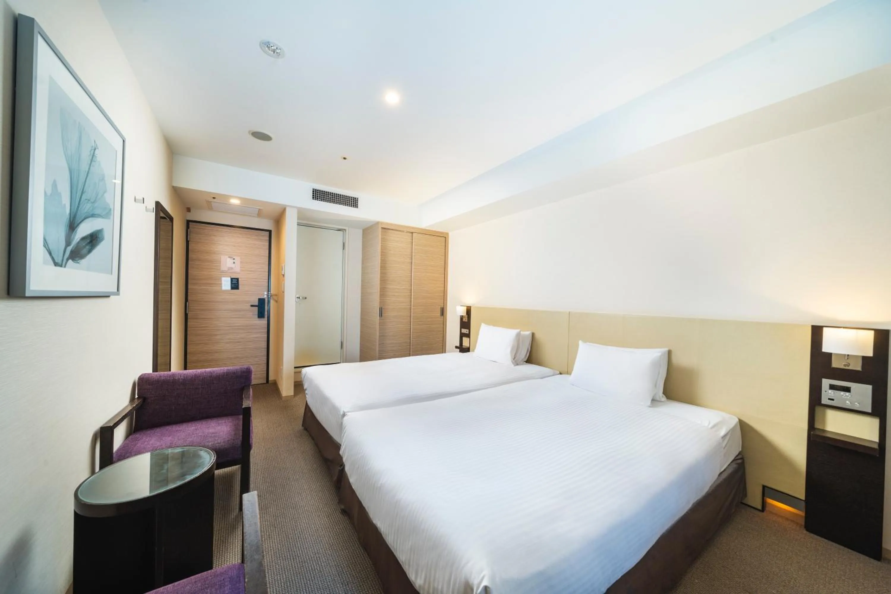 Bed in KOKO HOTEL Kobe Sannomiya