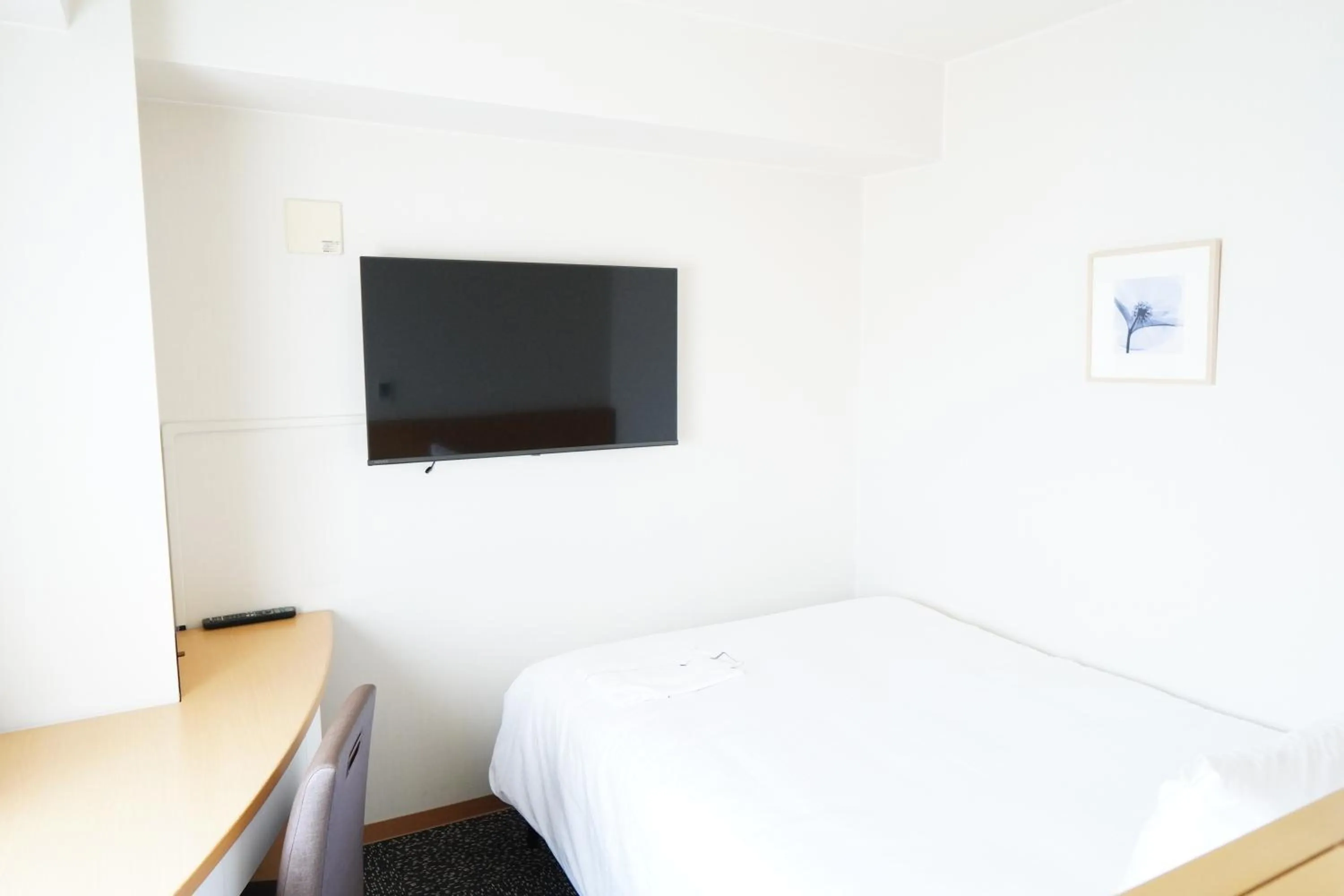 Bed in Hotel Sunflex Kagoshima