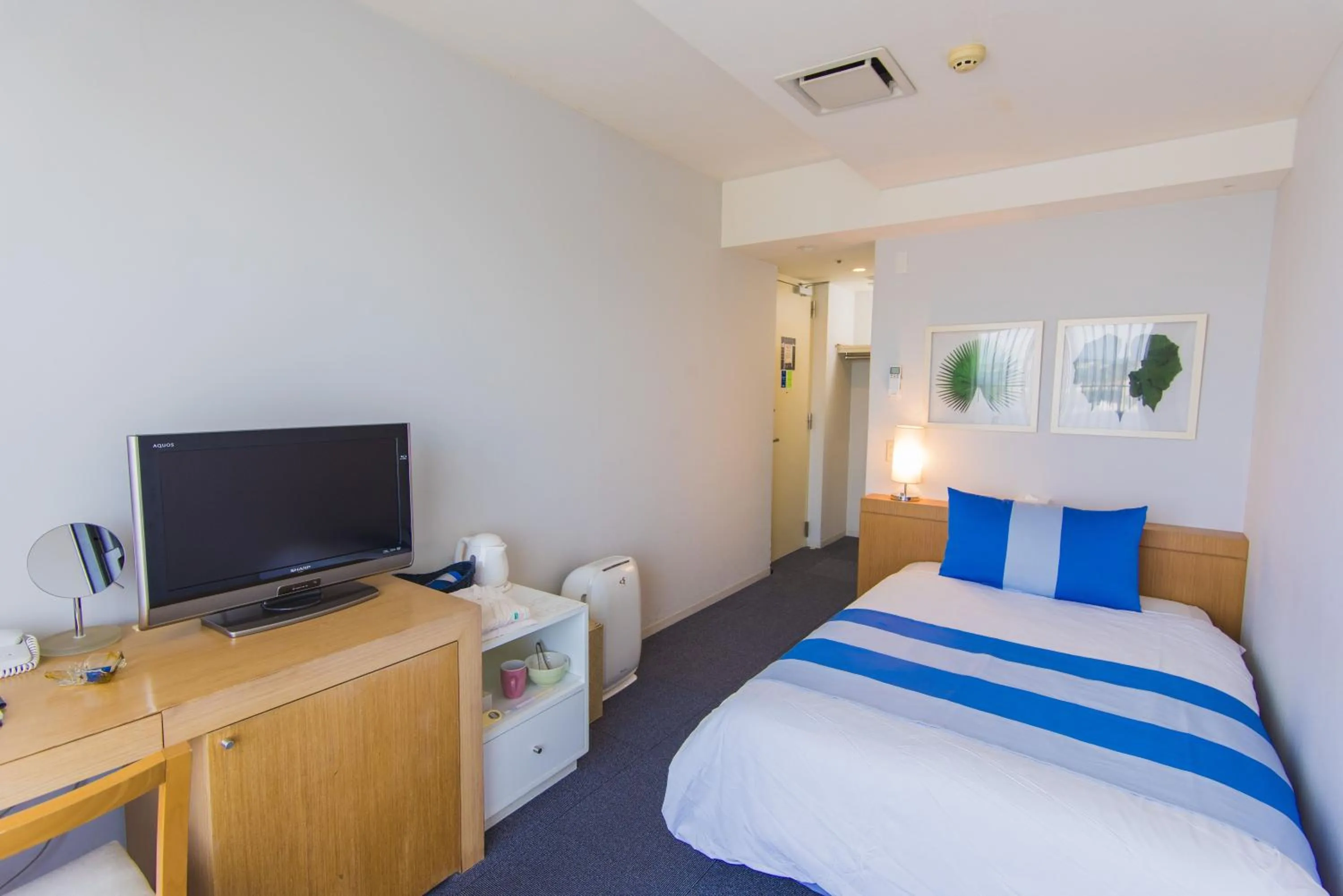 Bed in The Beach Tower Okinawa