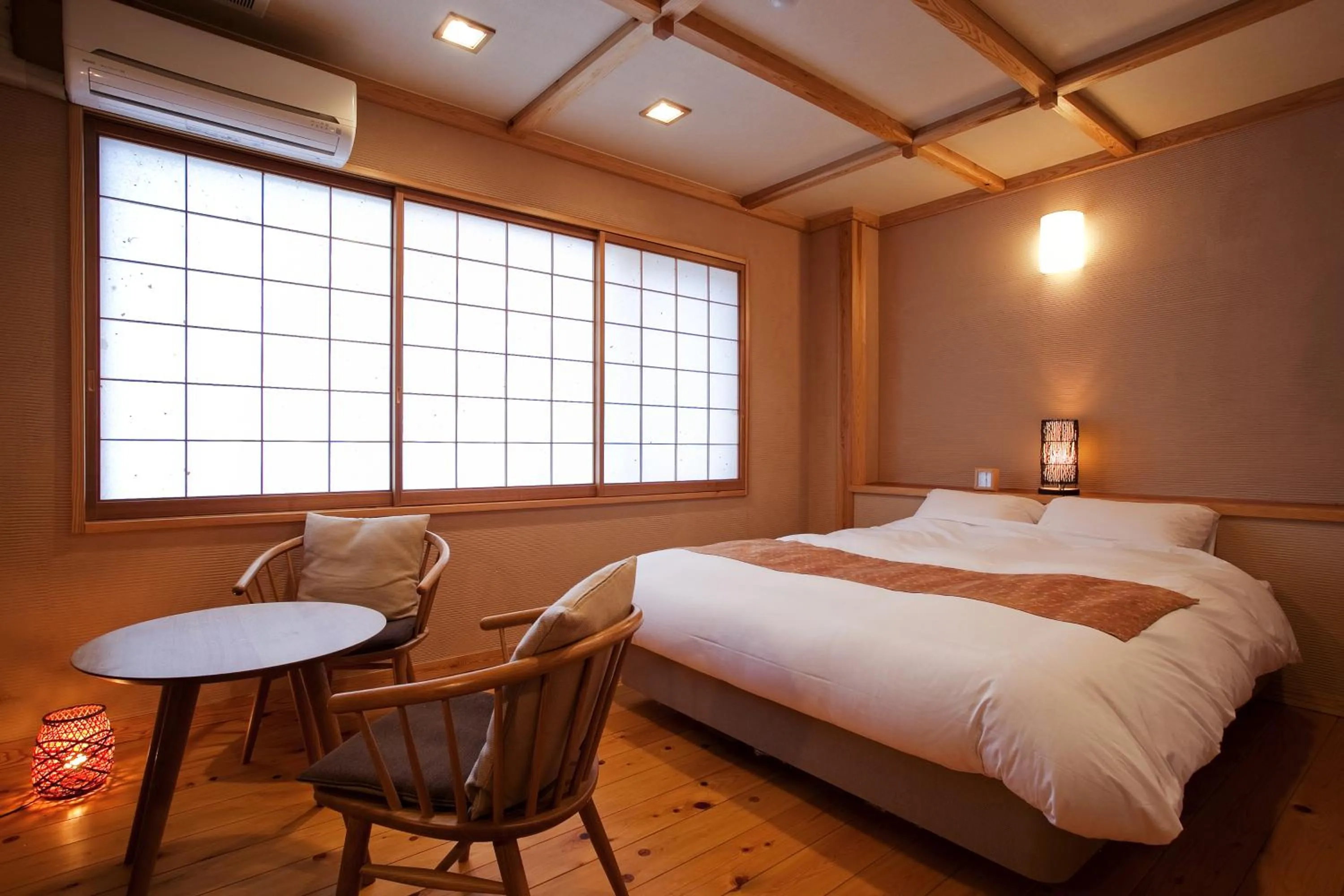 Bed in Miyama Ouan Kyoritsu Resort