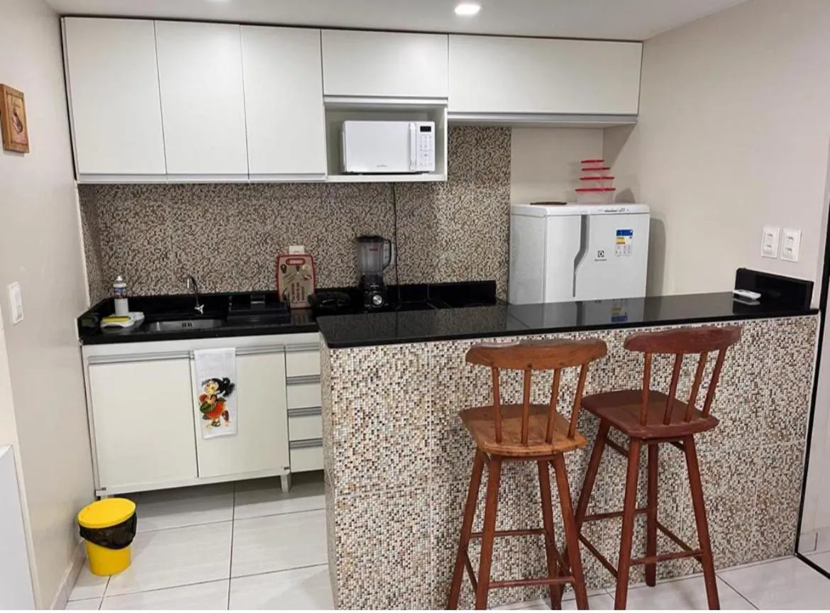 Kitchen or kitchenette in Atlântico Flat 104 e 116