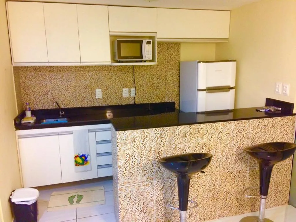 Kitchen or kitchenette in Atlântico Flat 104 e 116