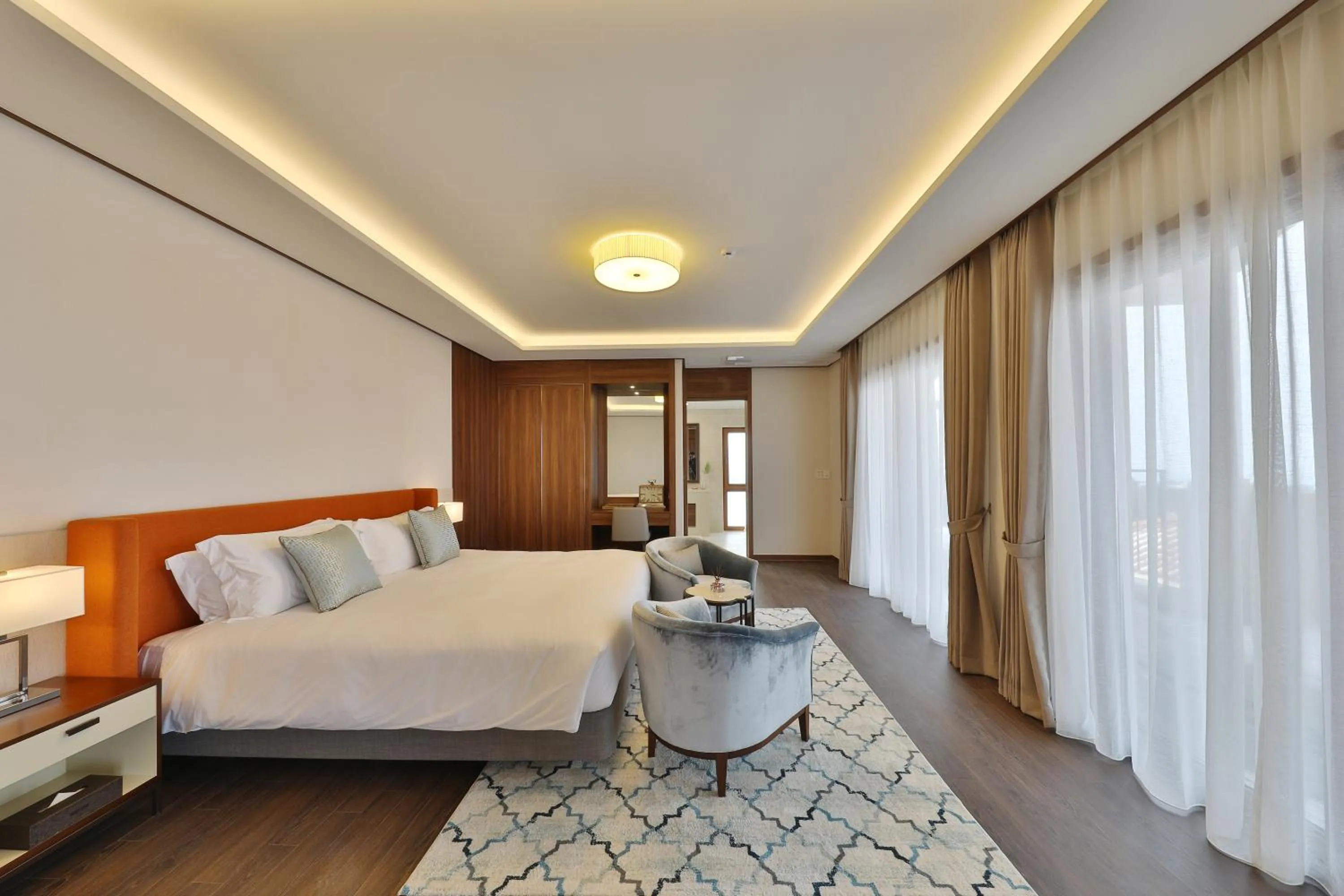 Bed in Camphortree Hotel and Resort