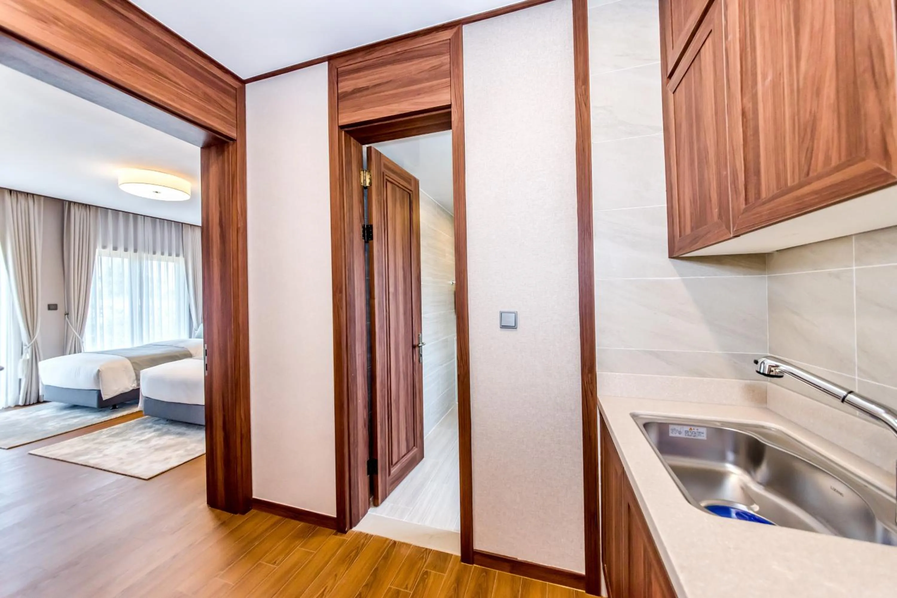 Bed in Camphortree Hotel and Resort