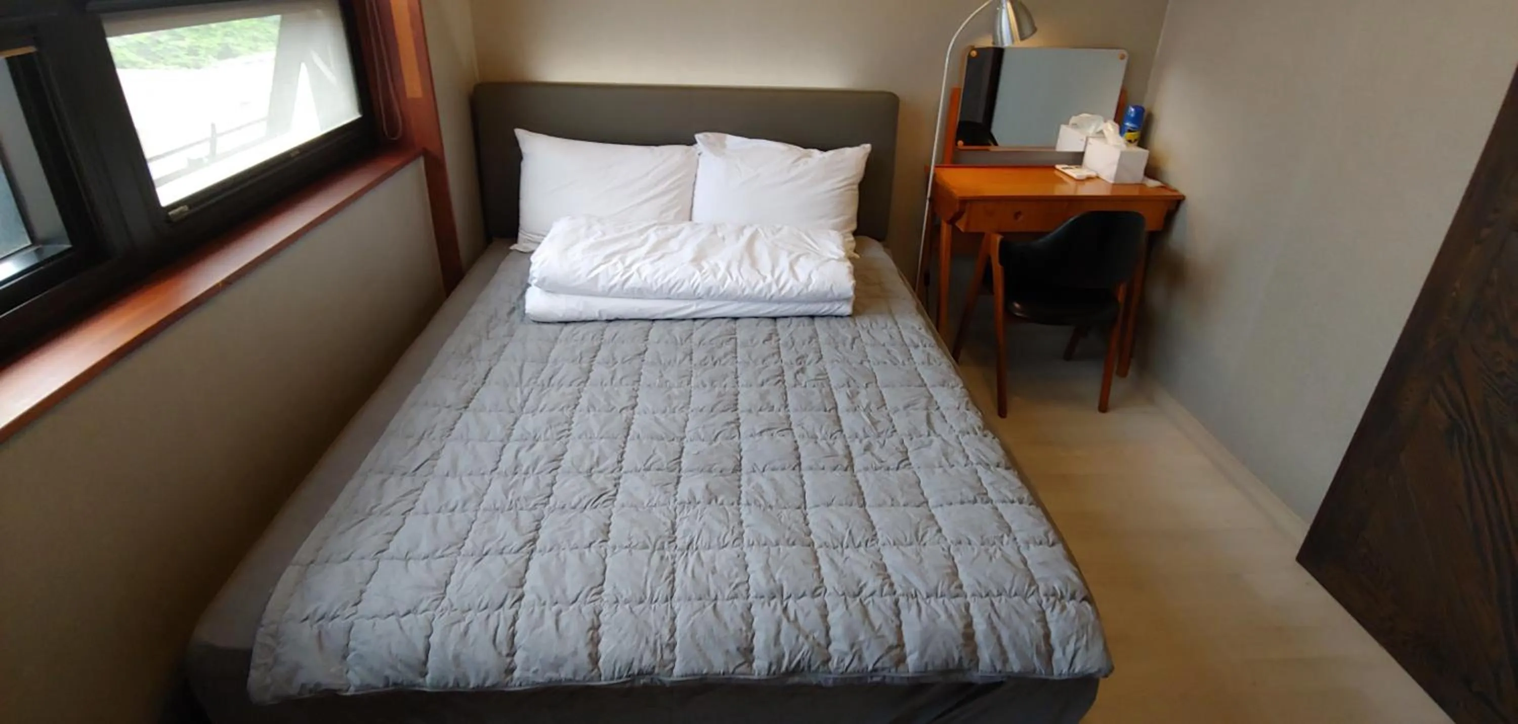 Bed in White Windmill Guesthouse