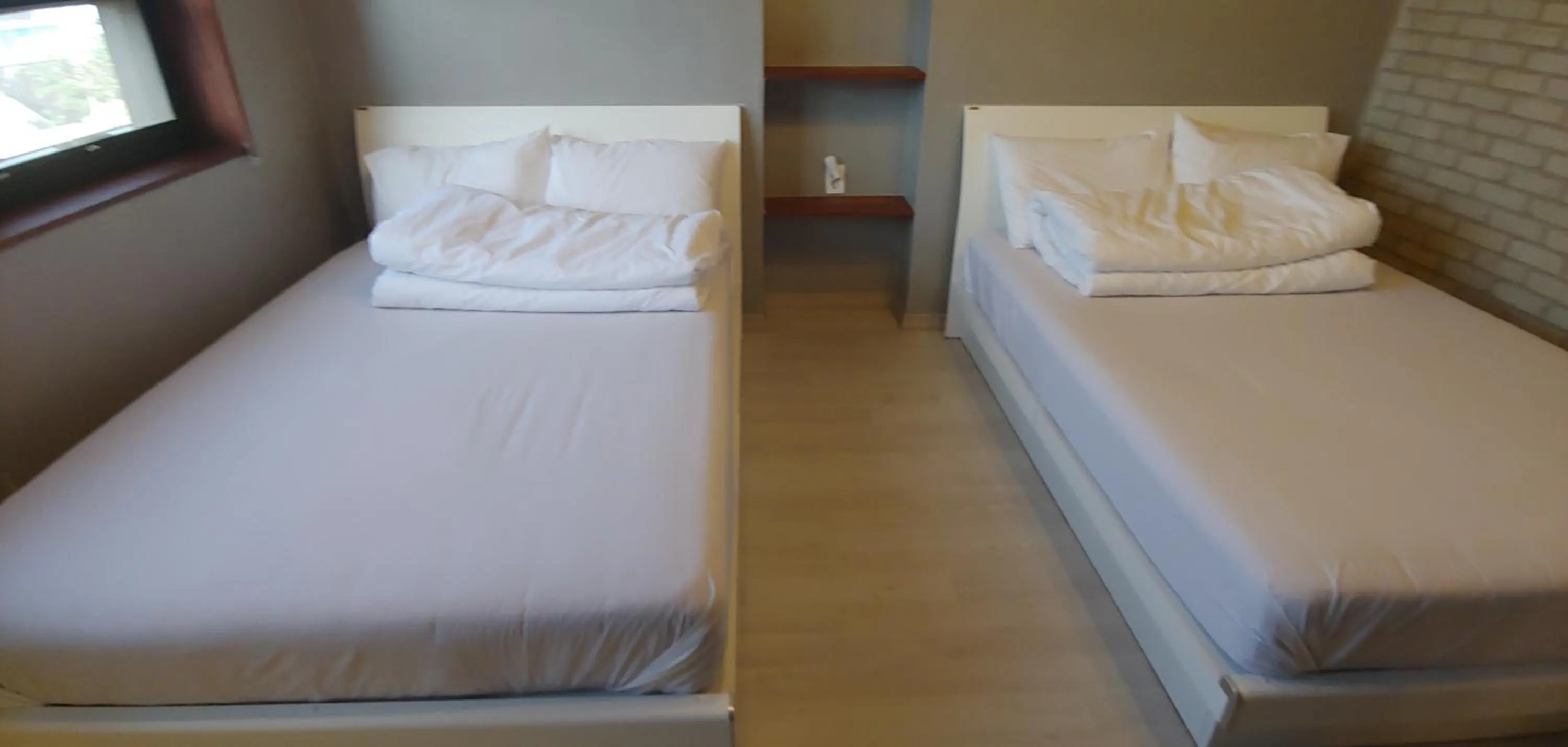 Bed in White Windmill Guesthouse