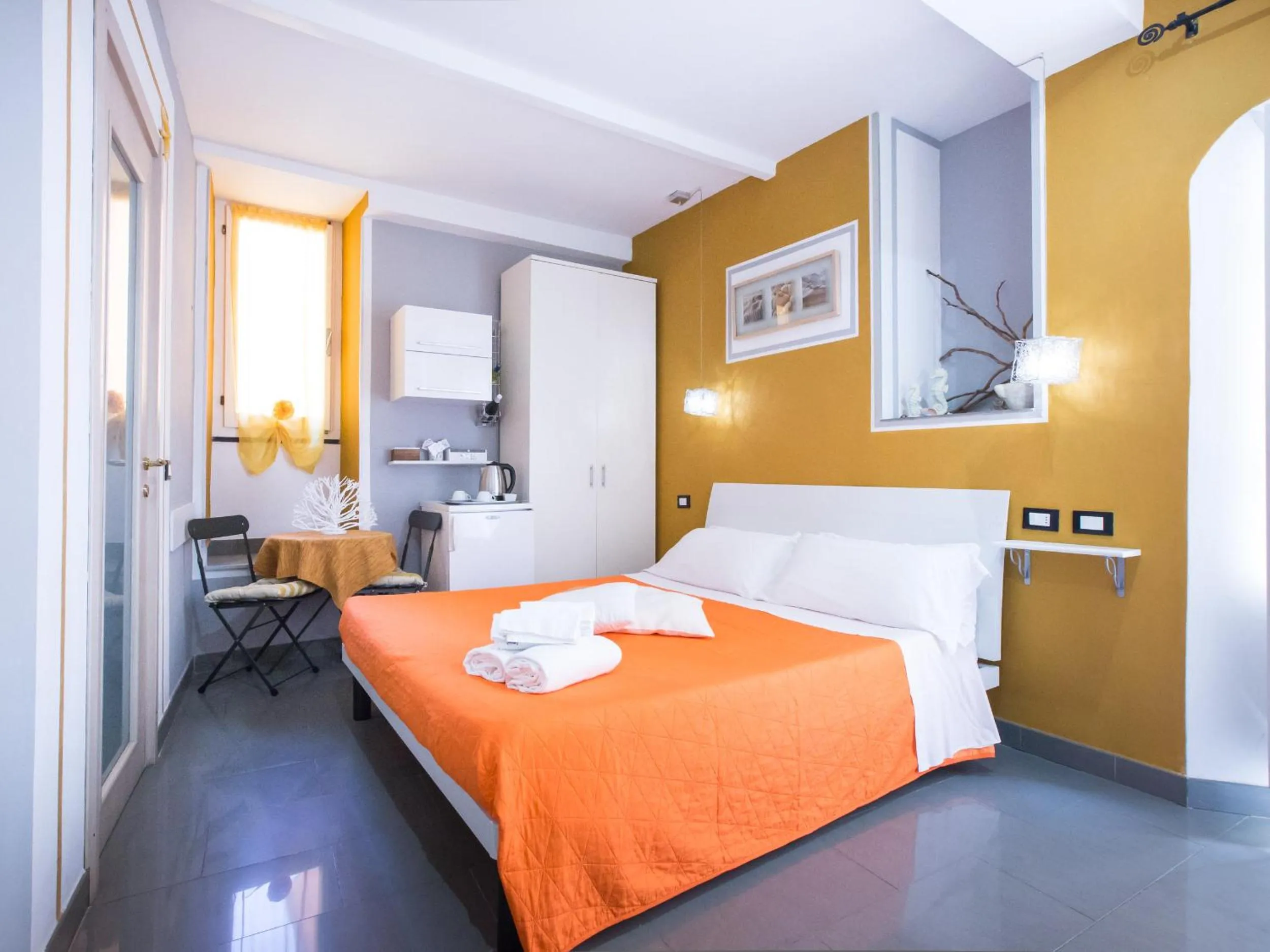 Bed in I Coralli rooms & apartments