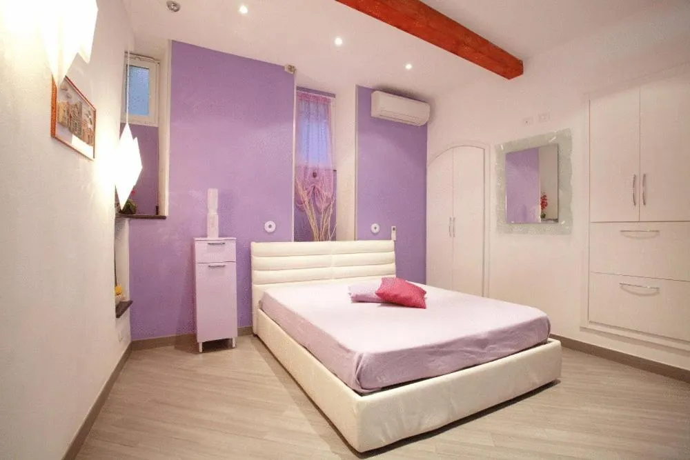 Bedroom, Bed in I Coralli rooms & apartments