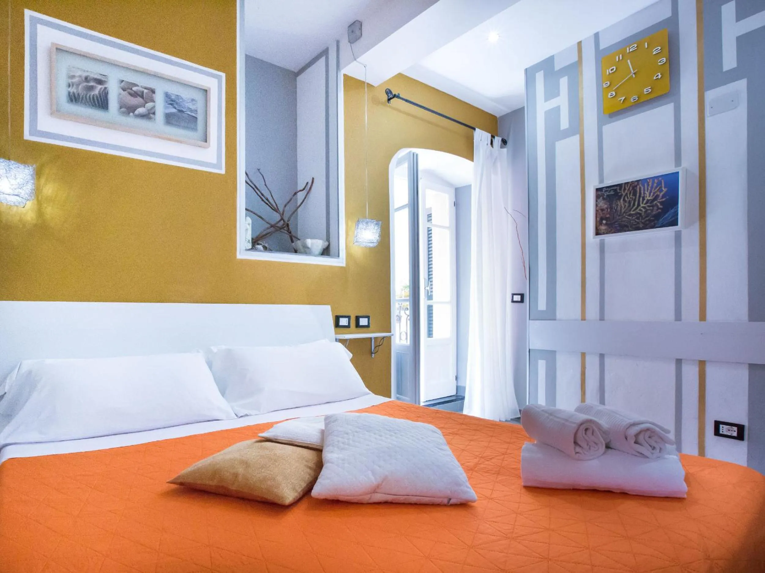 Bed in I Coralli rooms & apartments