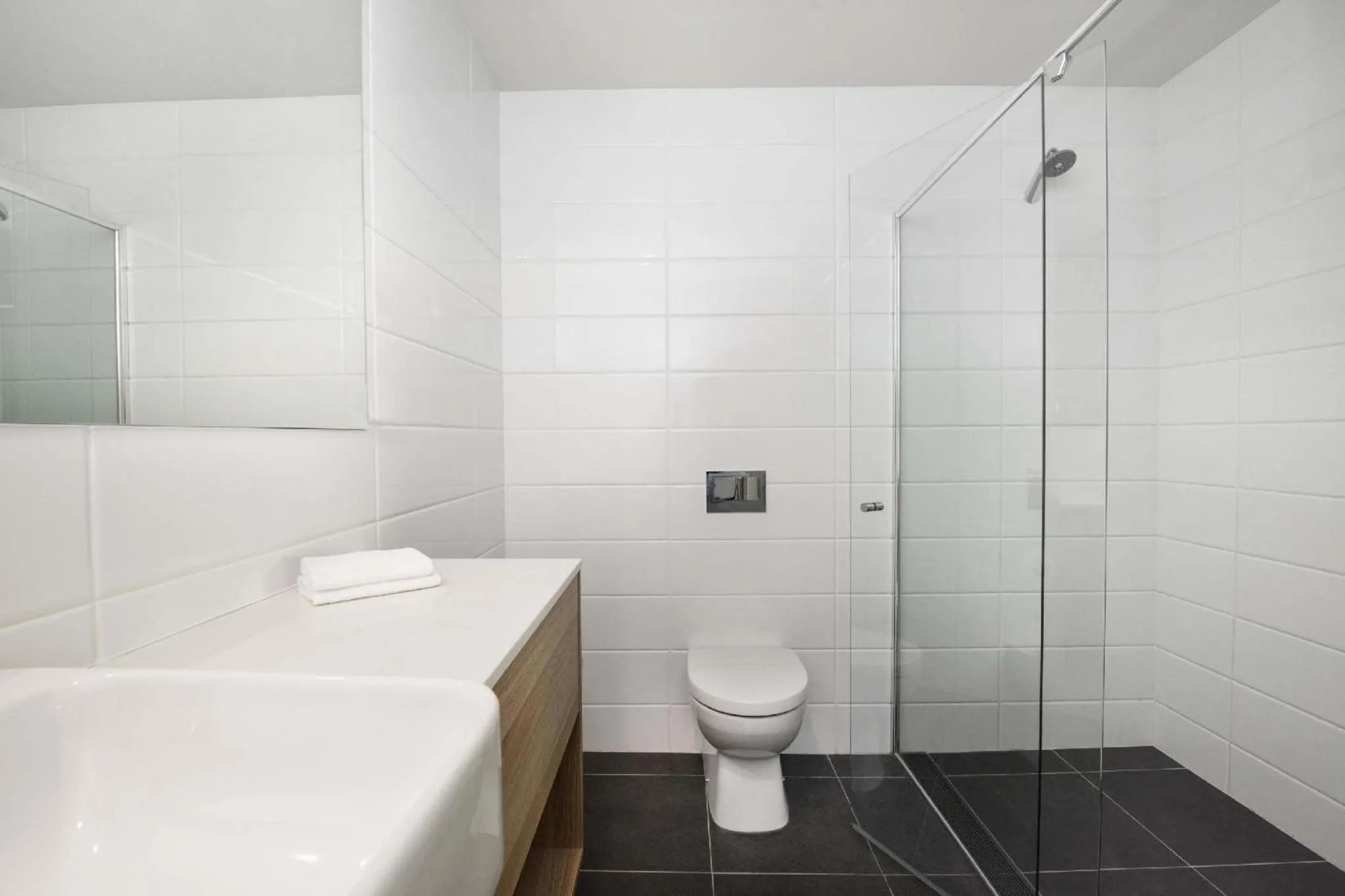 Bathroom in Mantra MacArthur Hotel