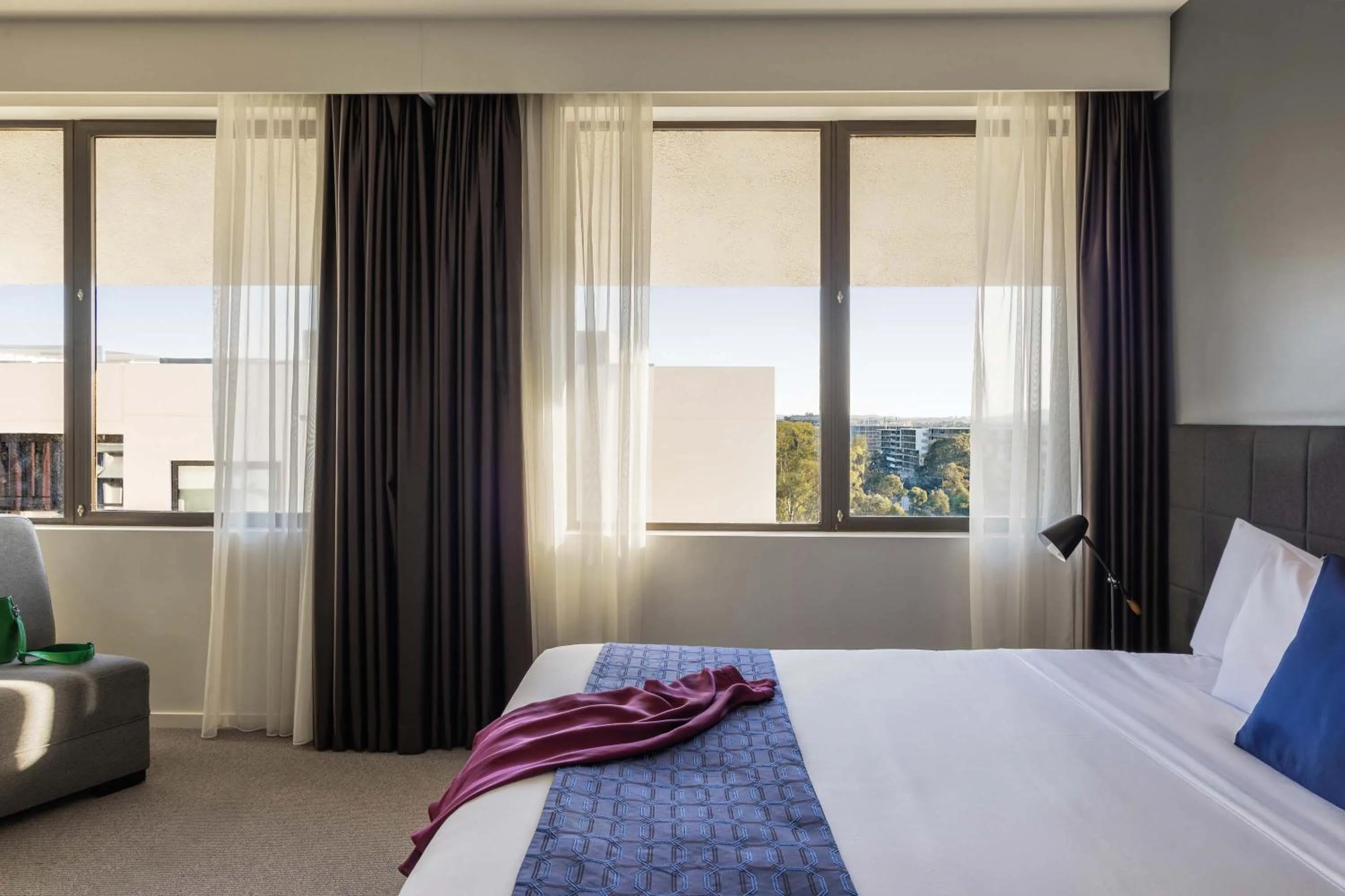 Bed in Mantra MacArthur Hotel