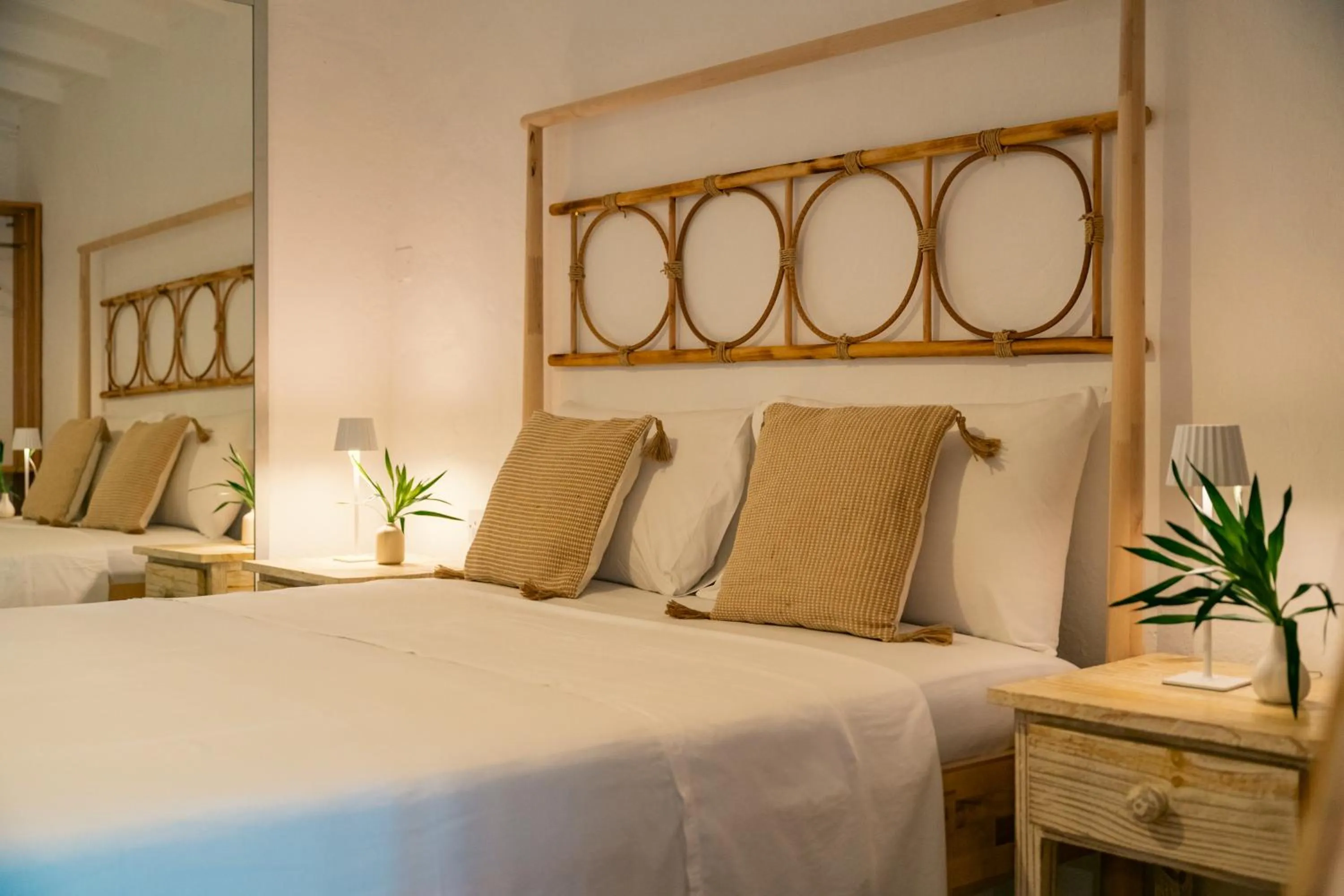 Bed in Beau Vallon Bungalows