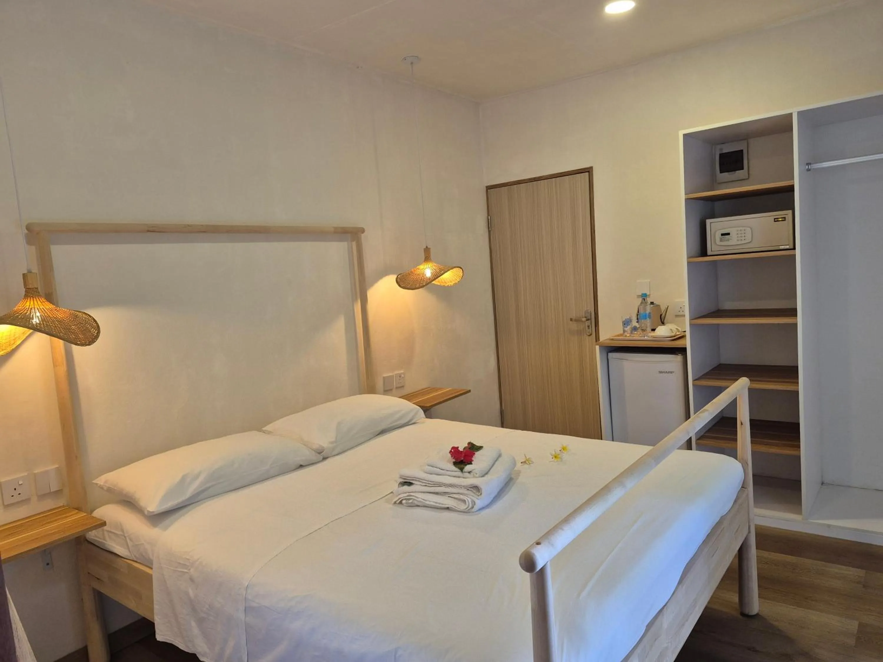 Bed in Beau Vallon Bungalows