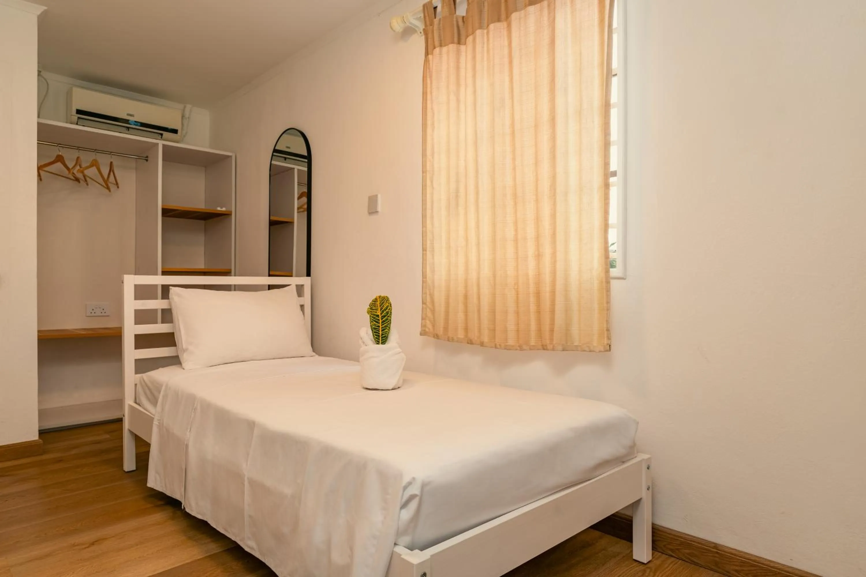 Bed in Beau Vallon Bungalows