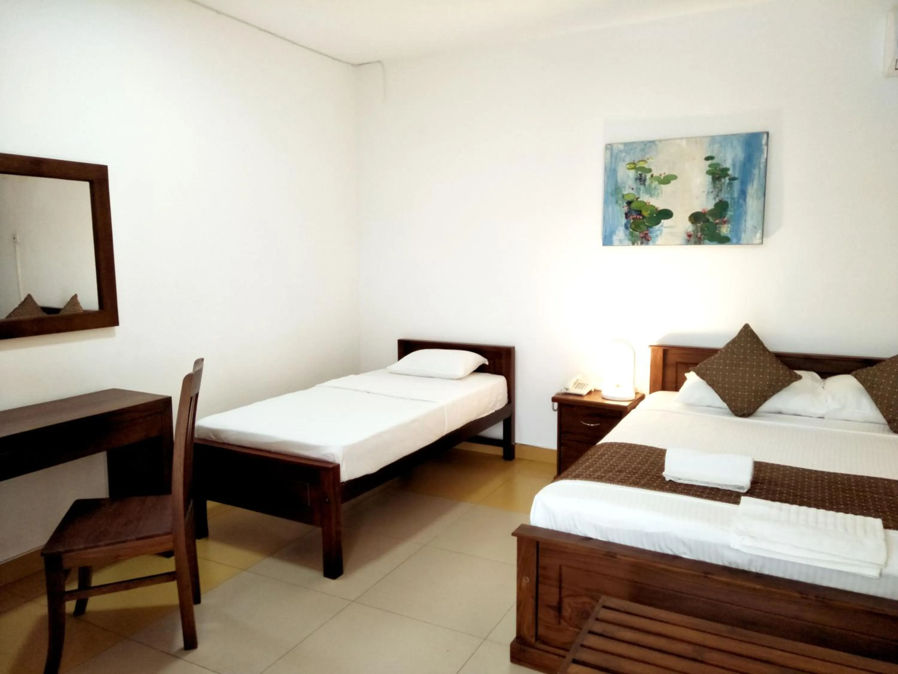 Bed in Sarvodaya Samma Vaasa Residence