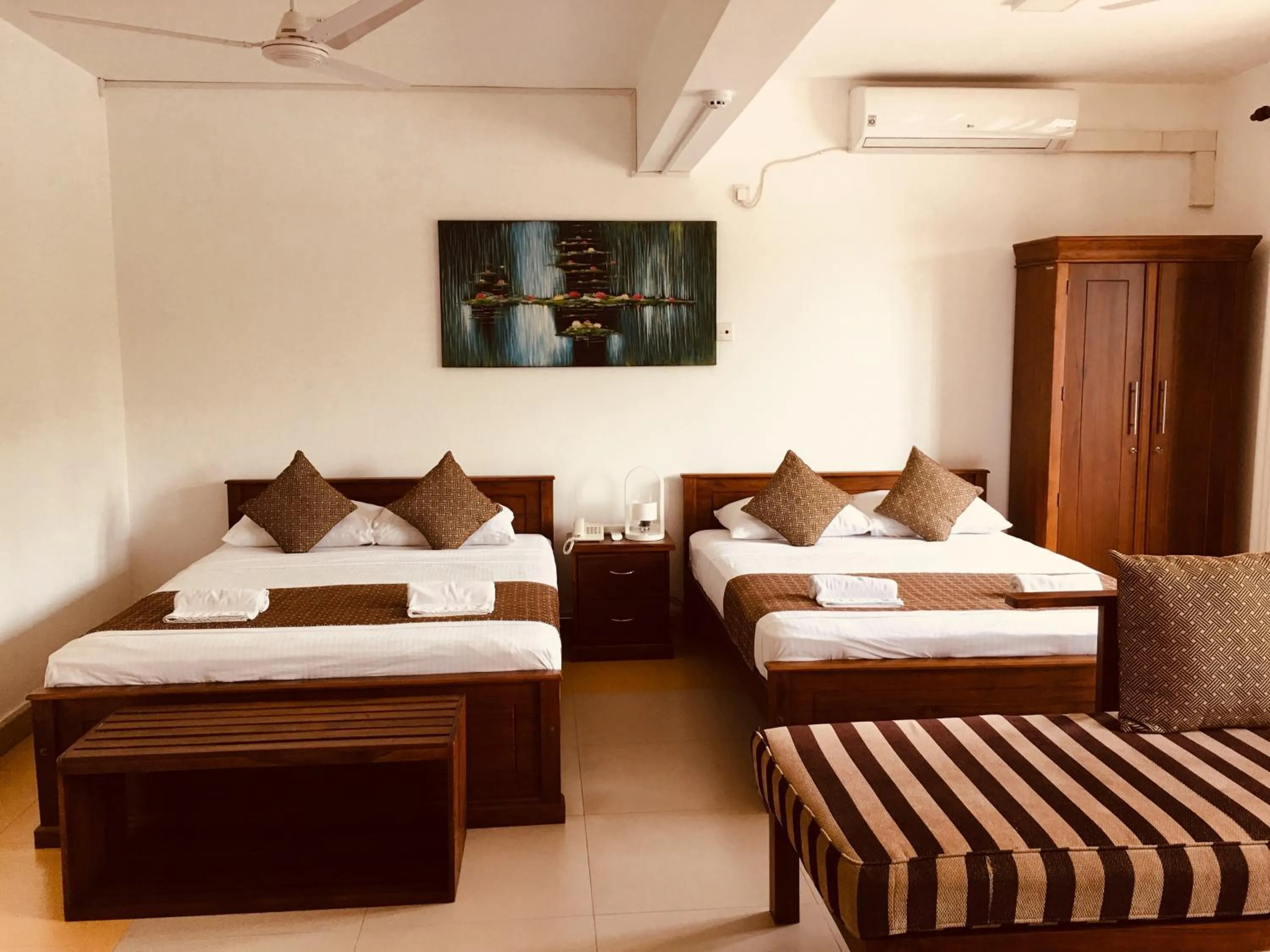 Bed in Sarvodaya Samma Vaasa Residence