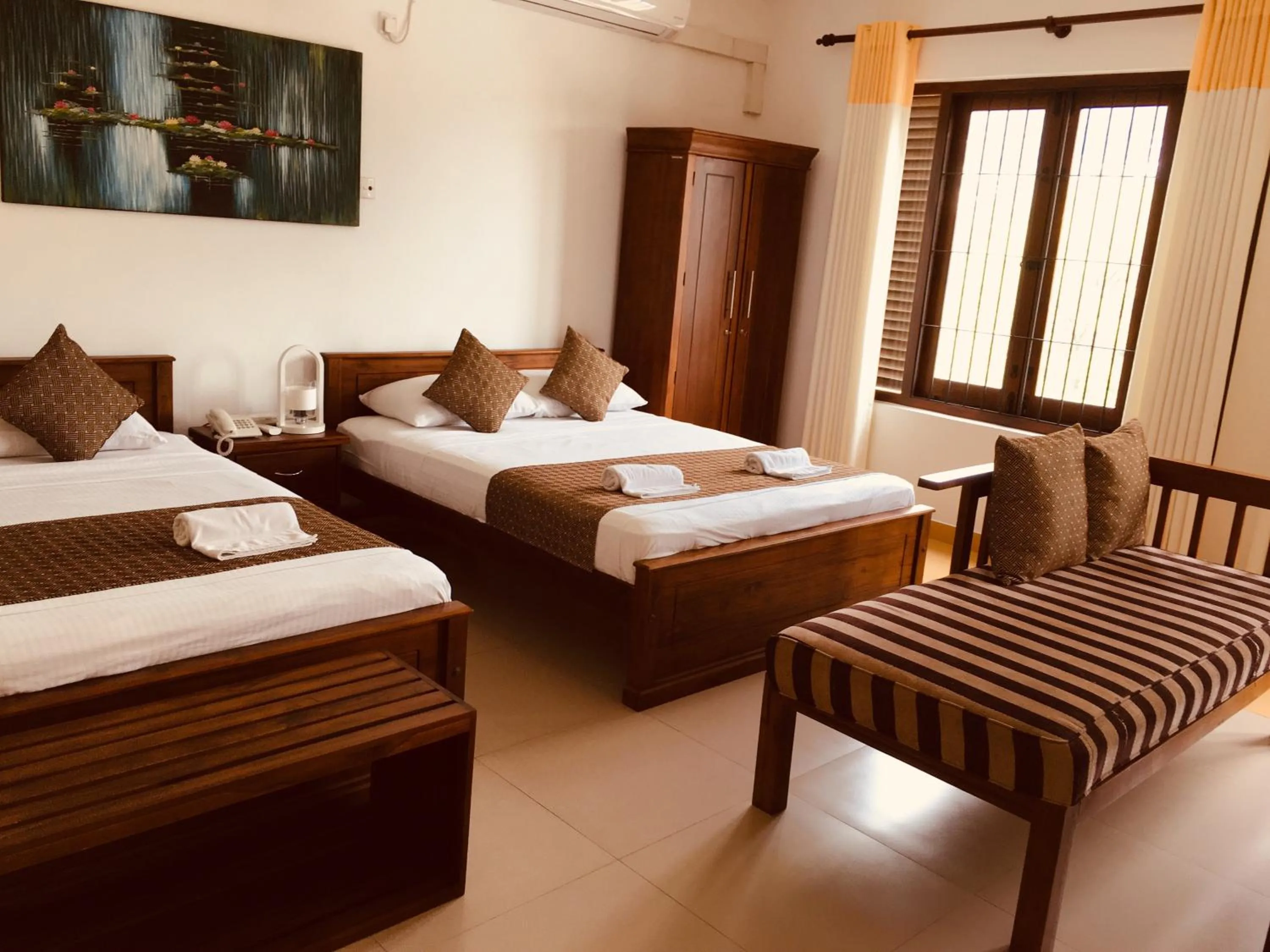 Bed in Sarvodaya Samma Vaasa Residence