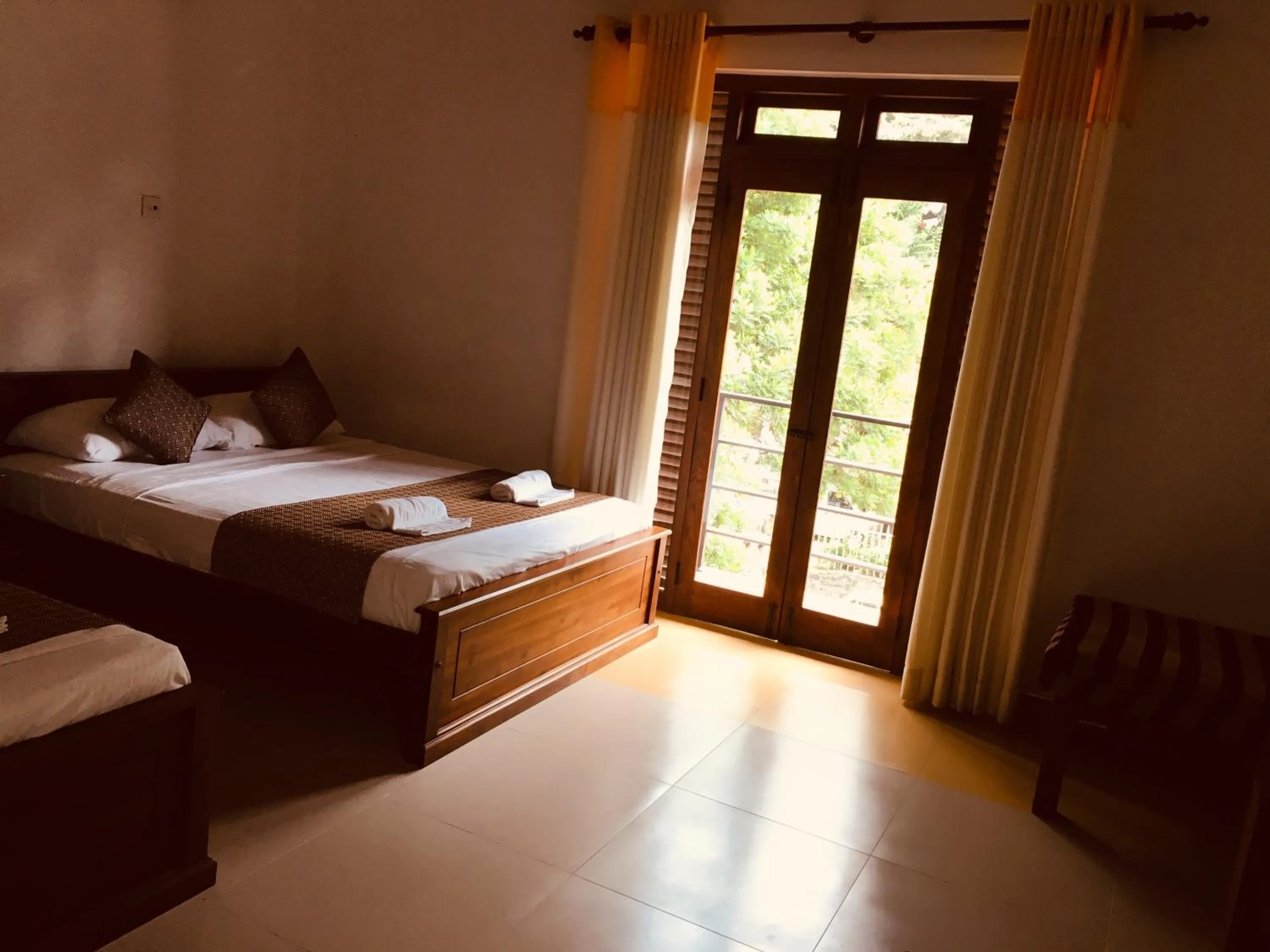 Bed in Sarvodaya Samma Vaasa Residence