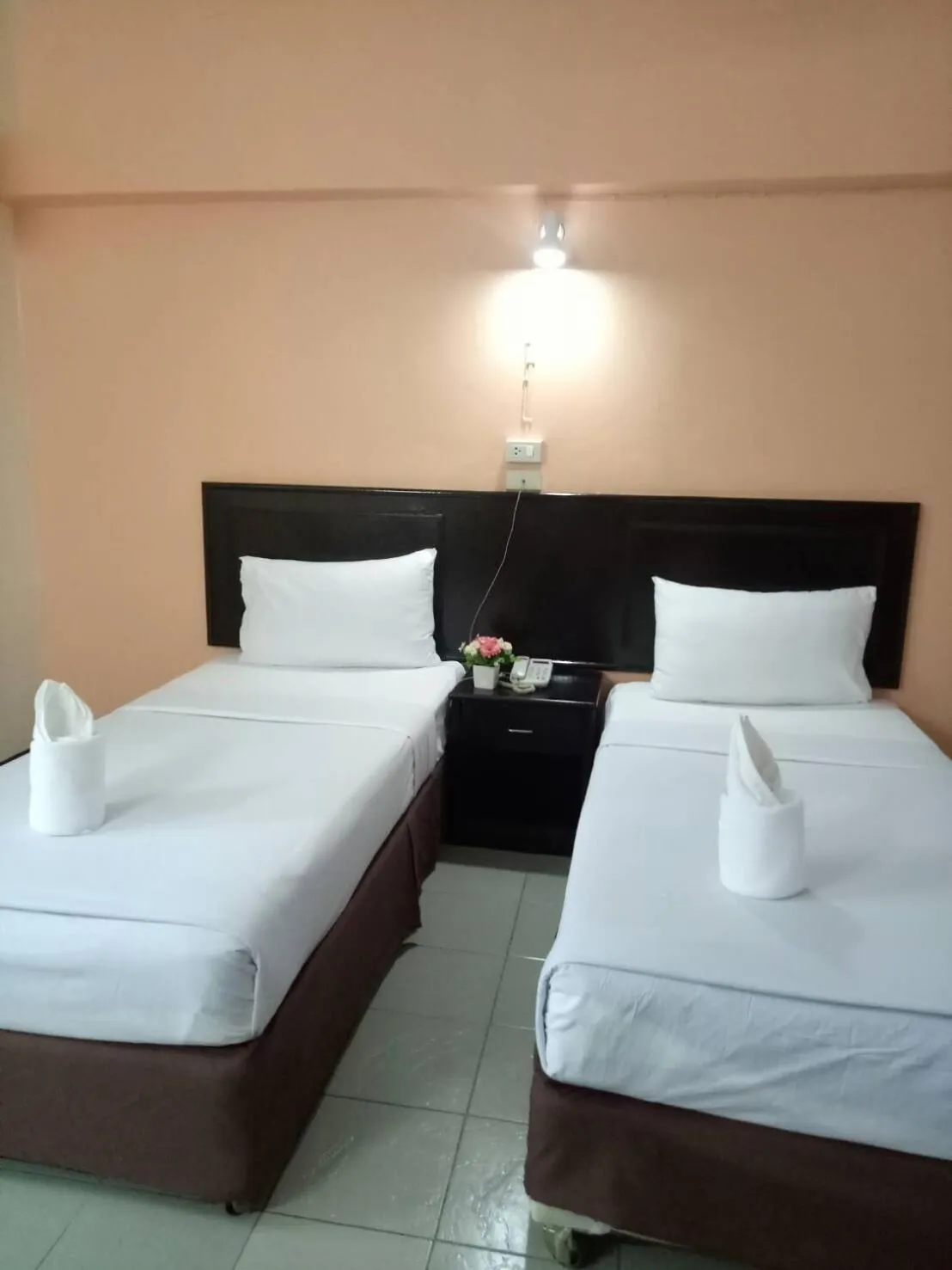 Bed in Centerpoint Hotel