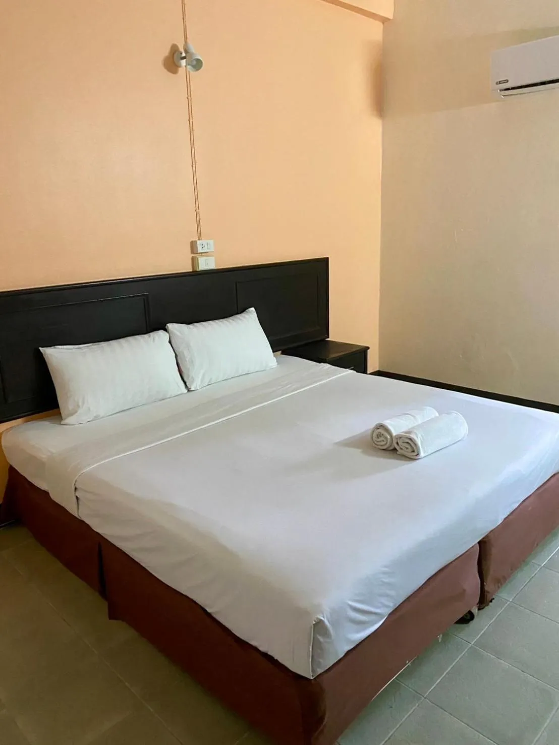 Bed in Centerpoint Hotel