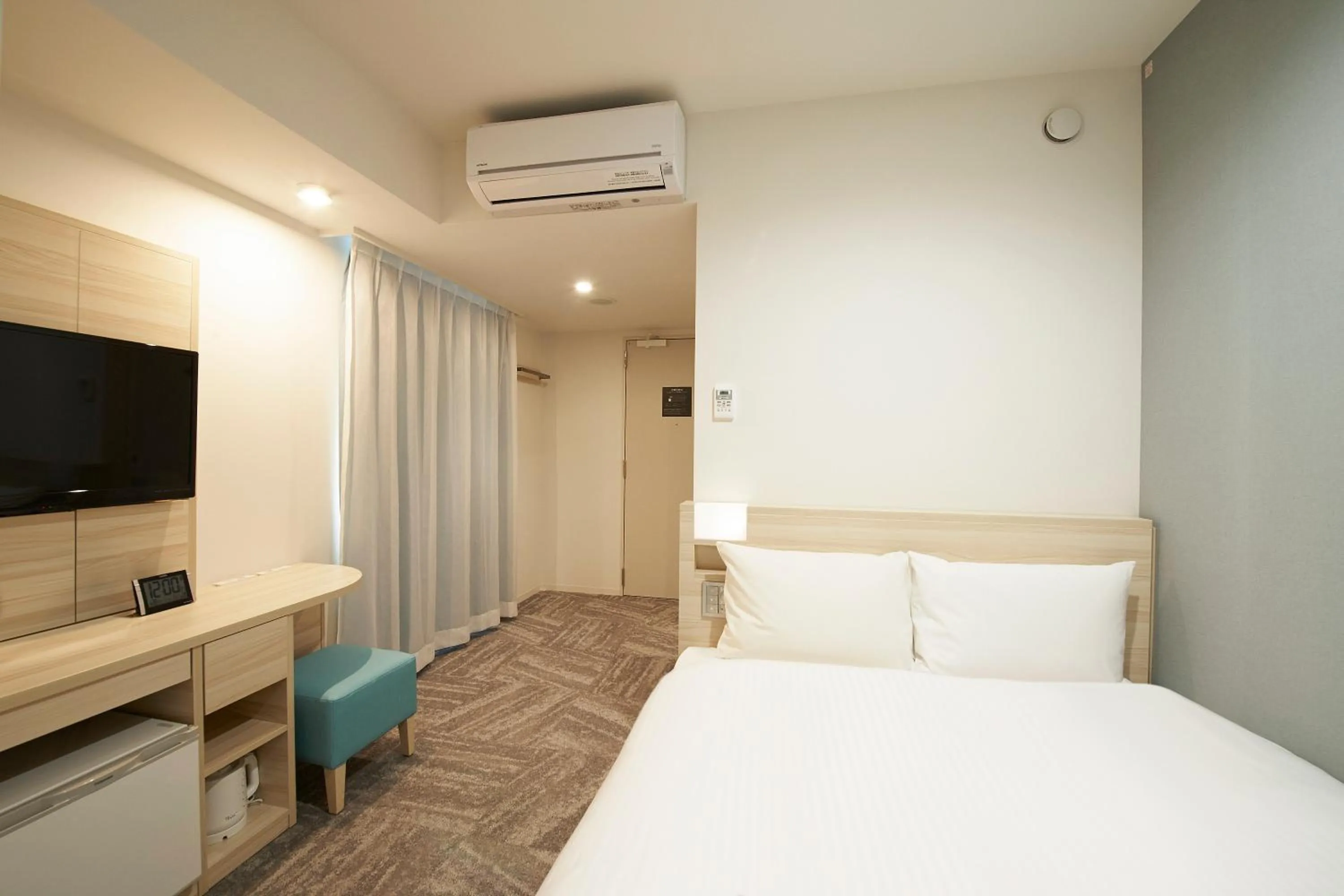 Bed in Sotetsu Fresa Inn Ueno-Okachimachi