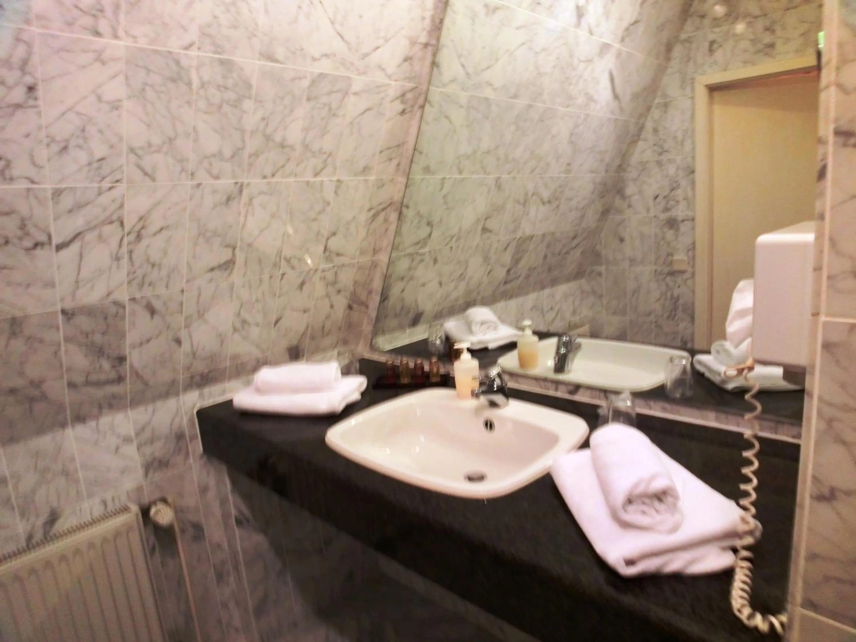 Bathroom in Hotel Nordic