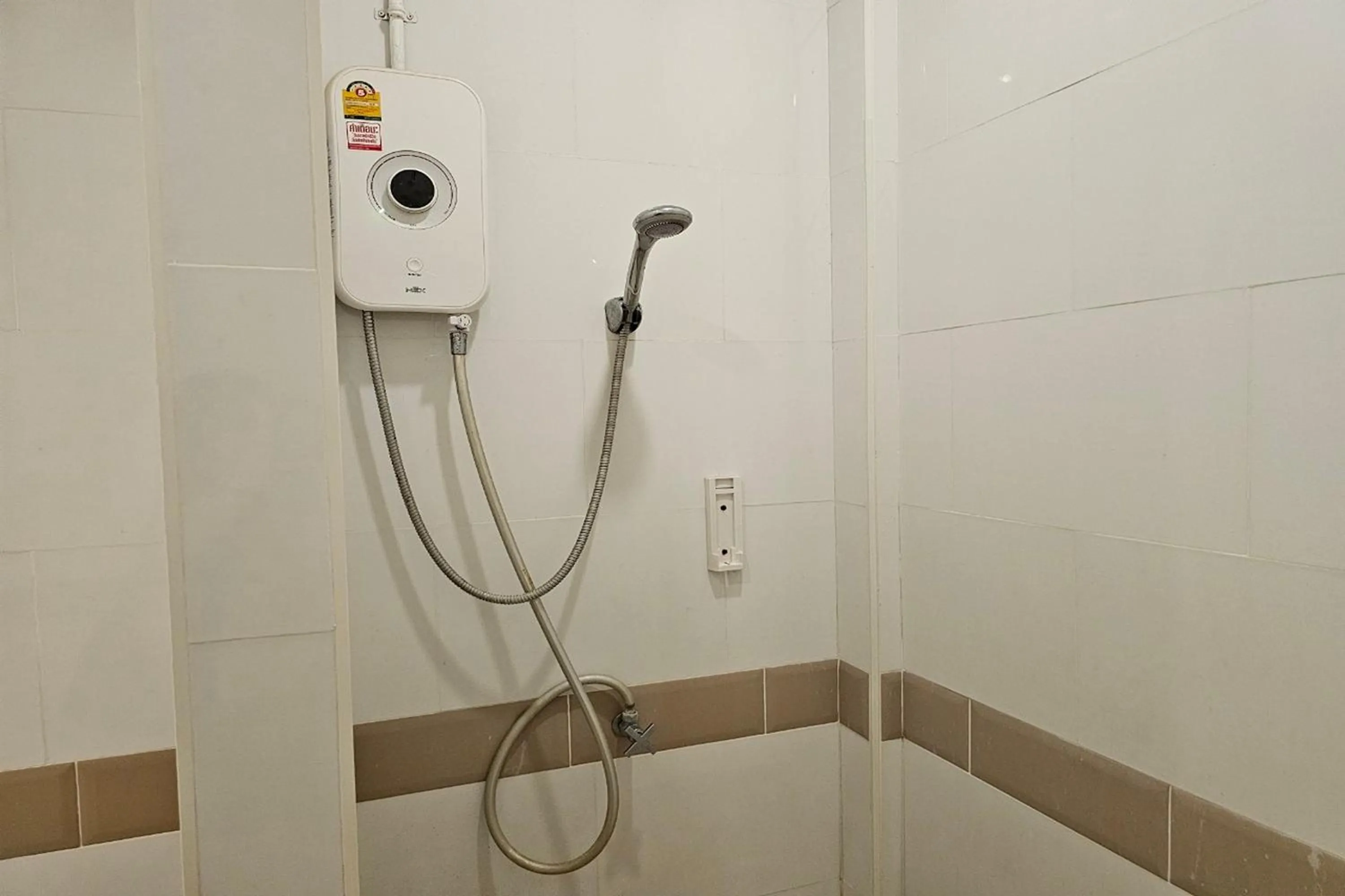 Shower in BW Thai Art Style Hotel