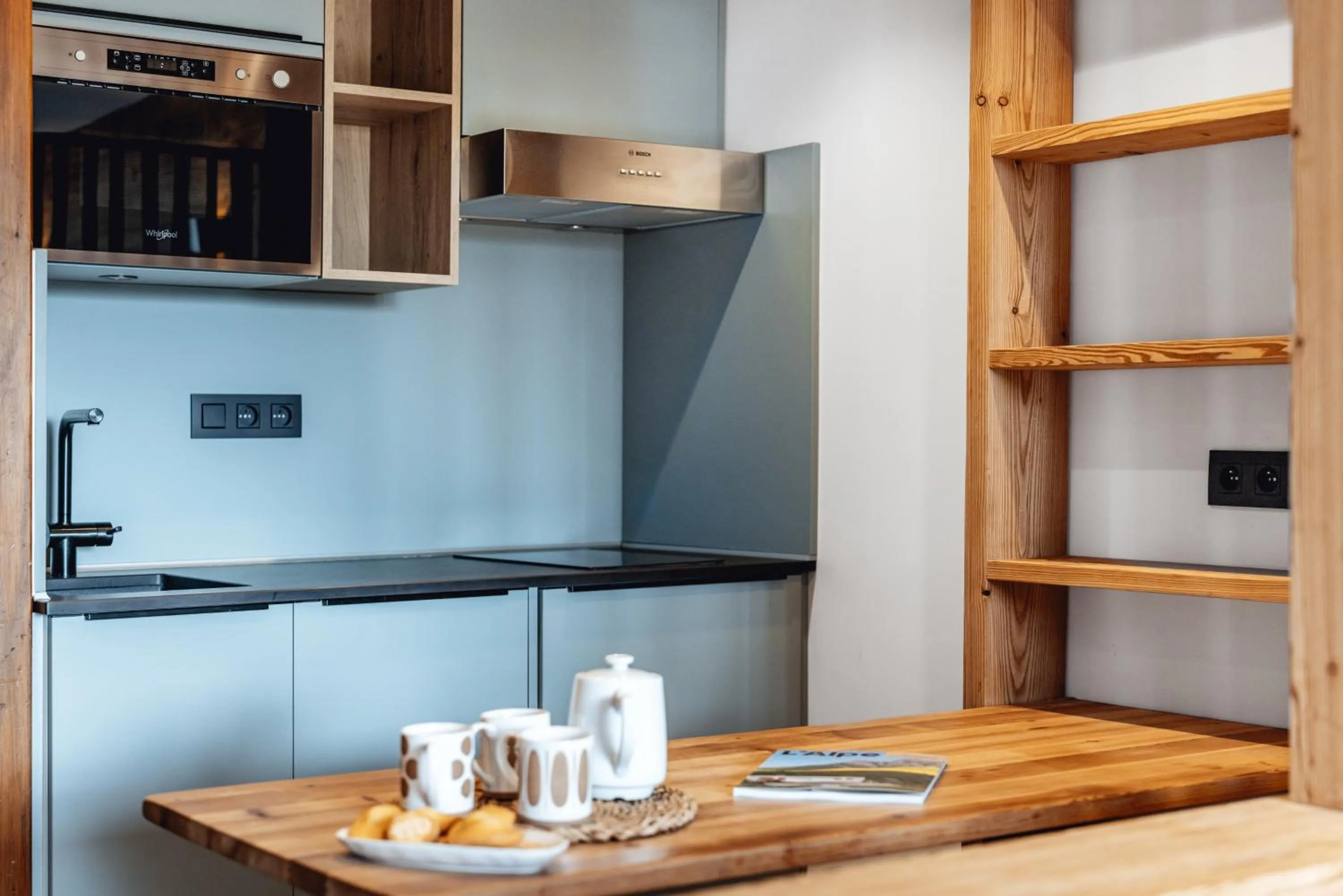 Kitchen or kitchenette in Alliey & Spa Piscine Appart-hôtel Serre chevalier