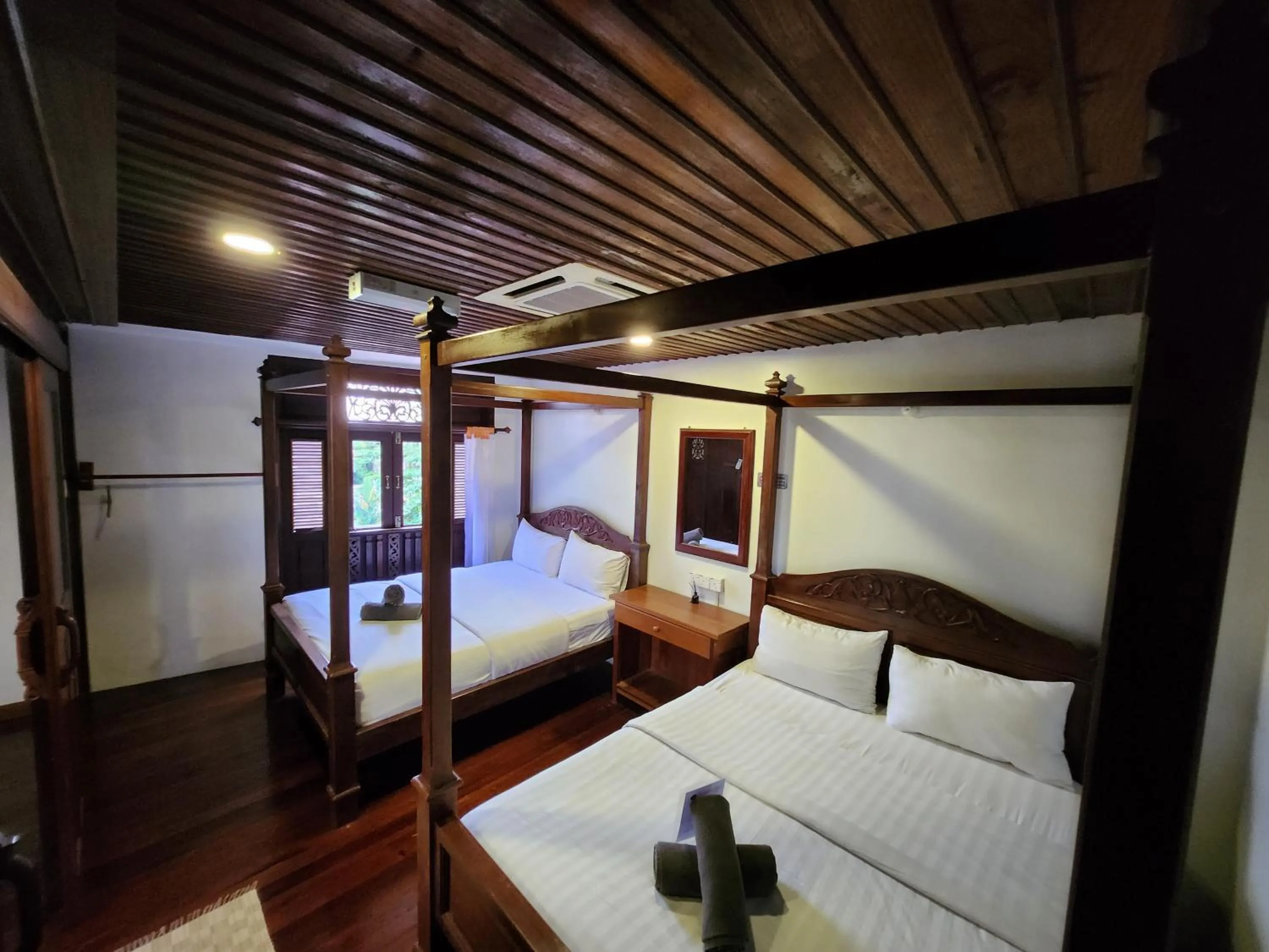 Bed in Uptown Eco Hotel