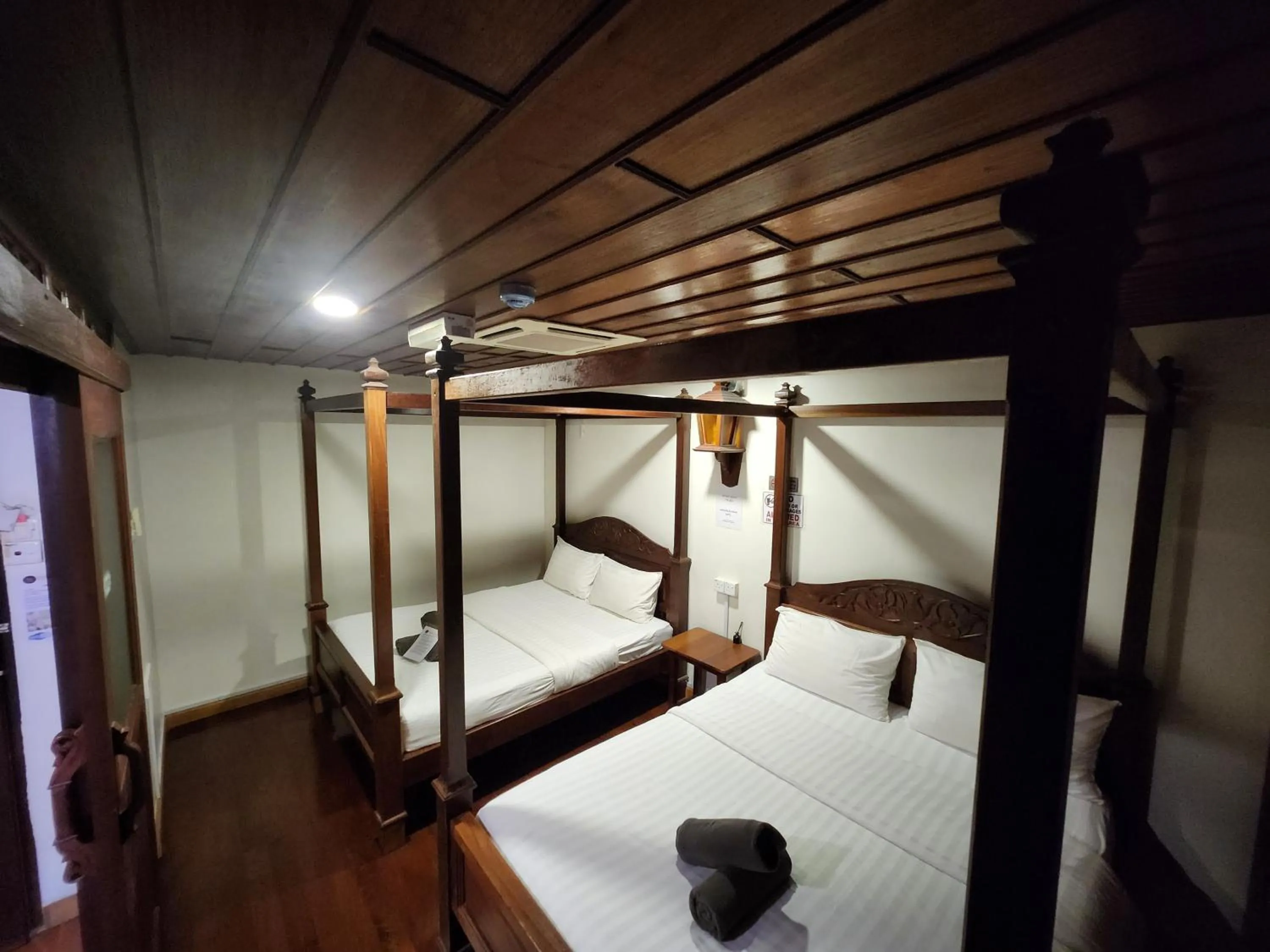 Bed in Uptown Eco Hotel