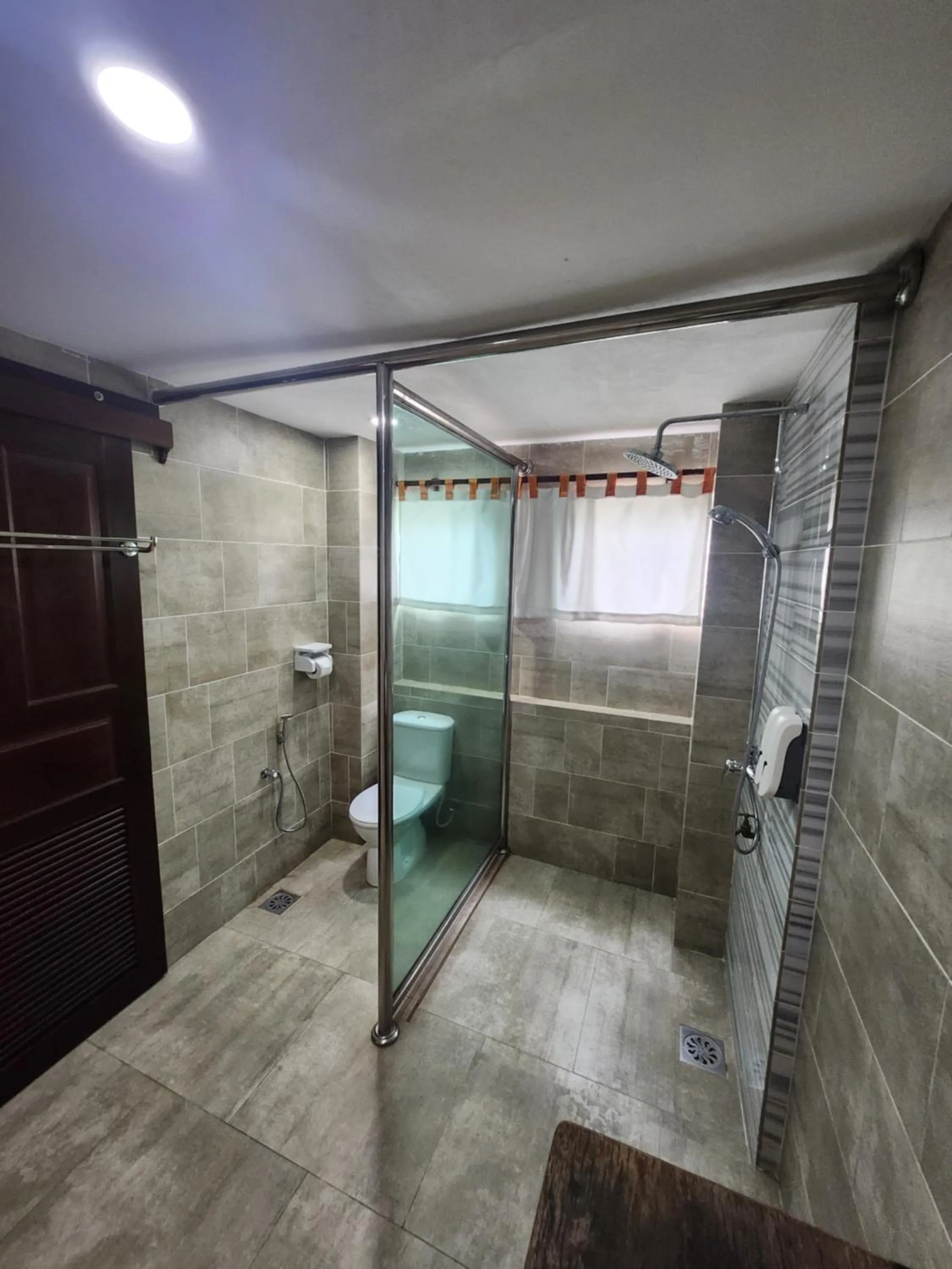 Toilet in Uptown Eco Hotel