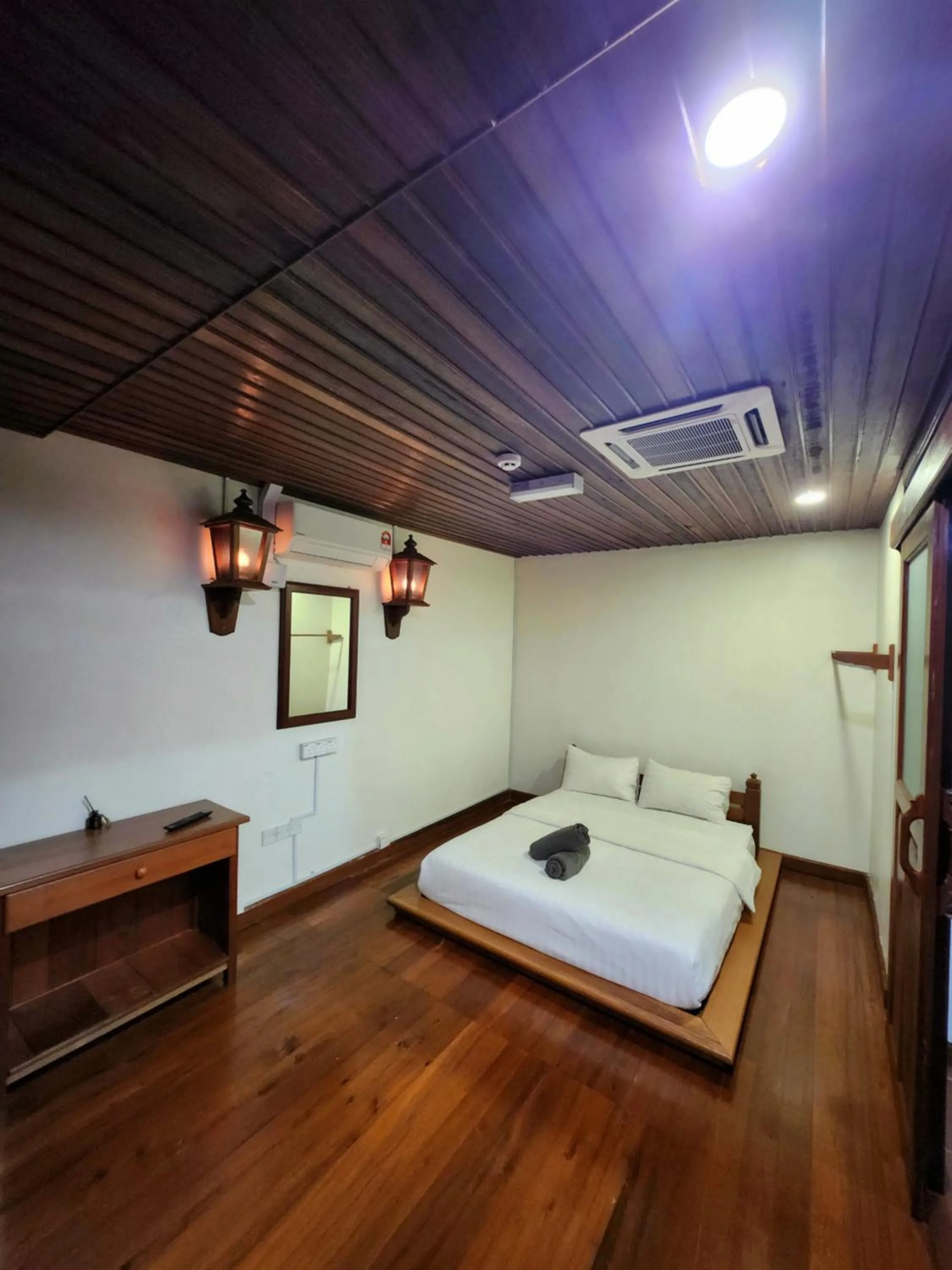 Bed in Uptown Eco Hotel