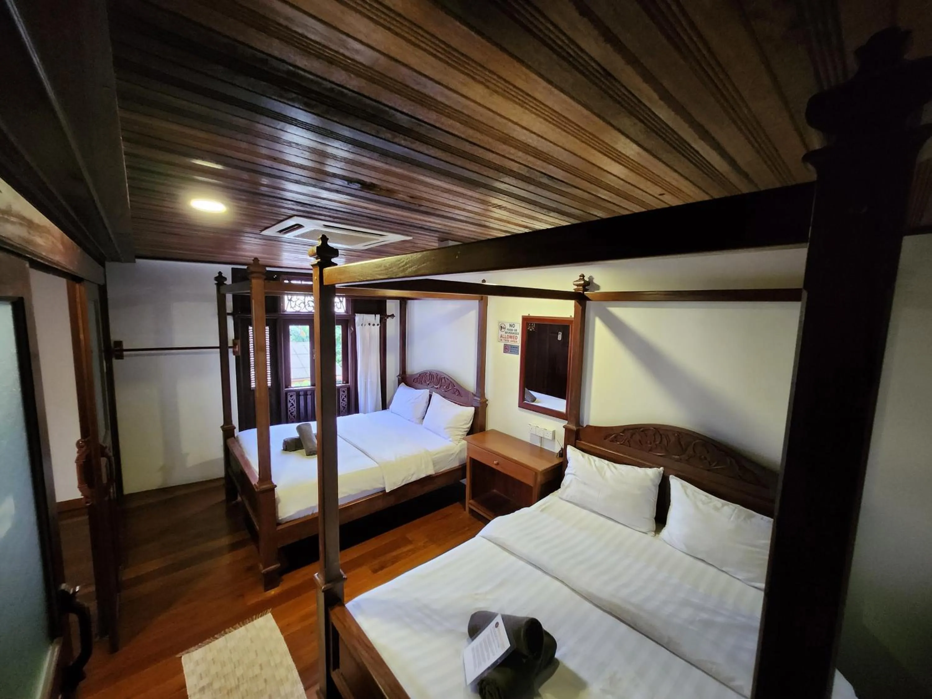 Bed in Uptown Eco Hotel