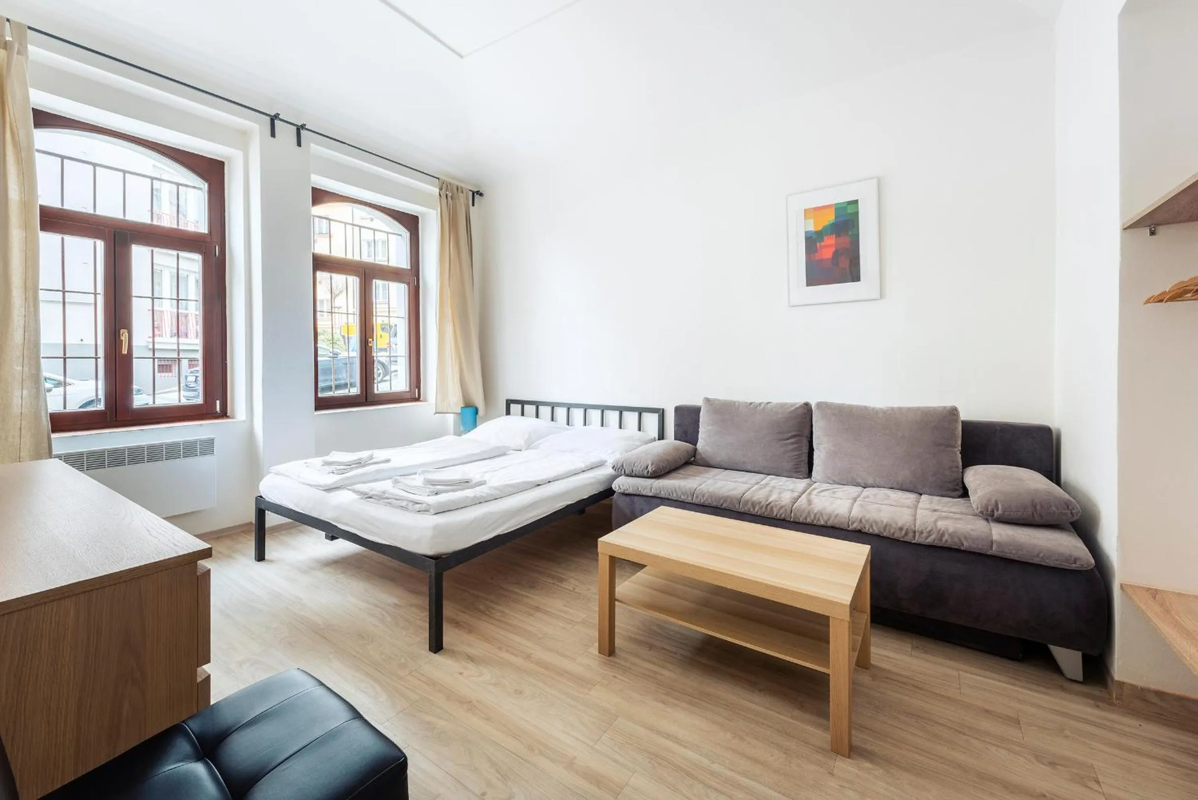 Living room, Bed in Family Apartments Praha 6