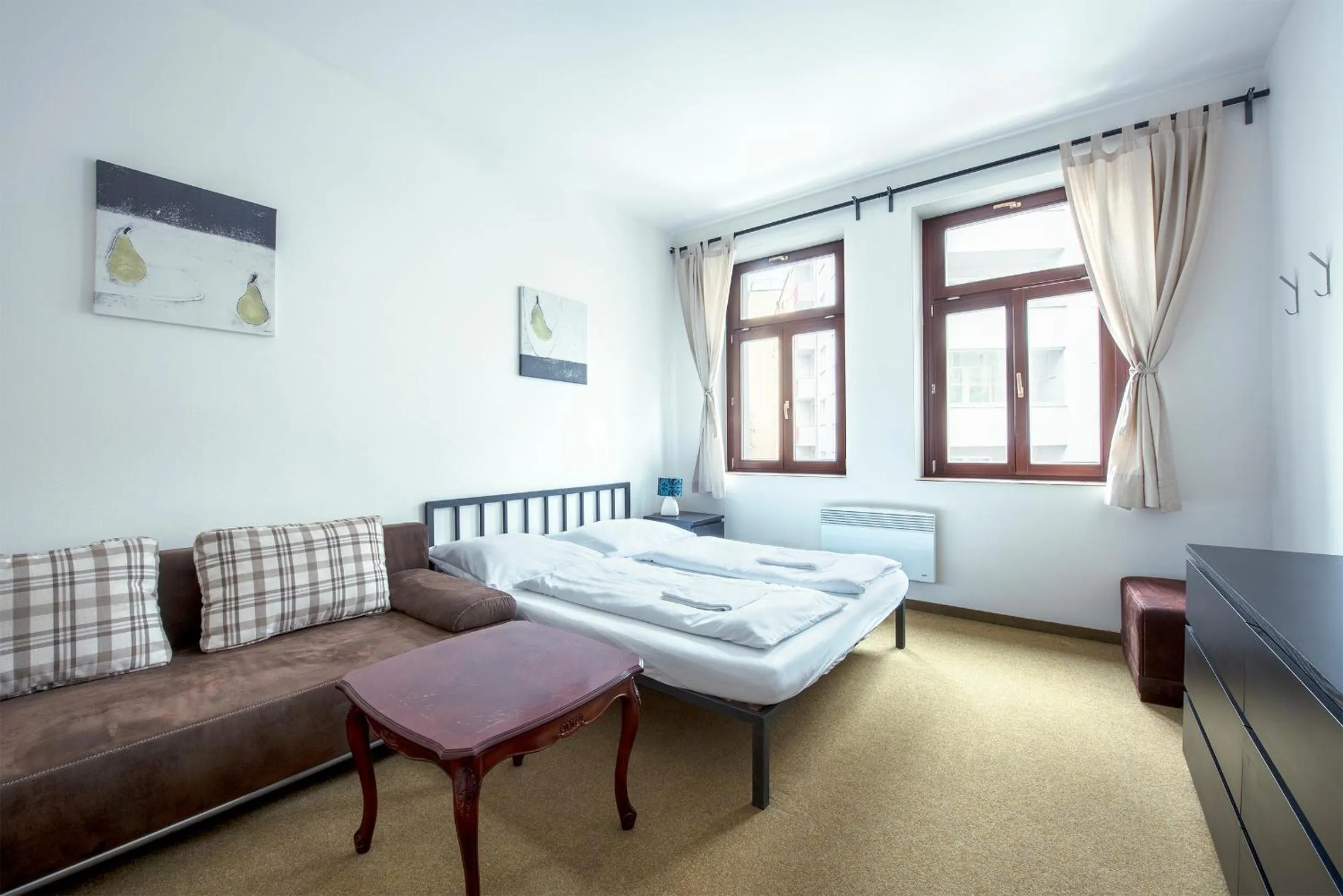 Living room, Bed in Family Apartments Praha 6