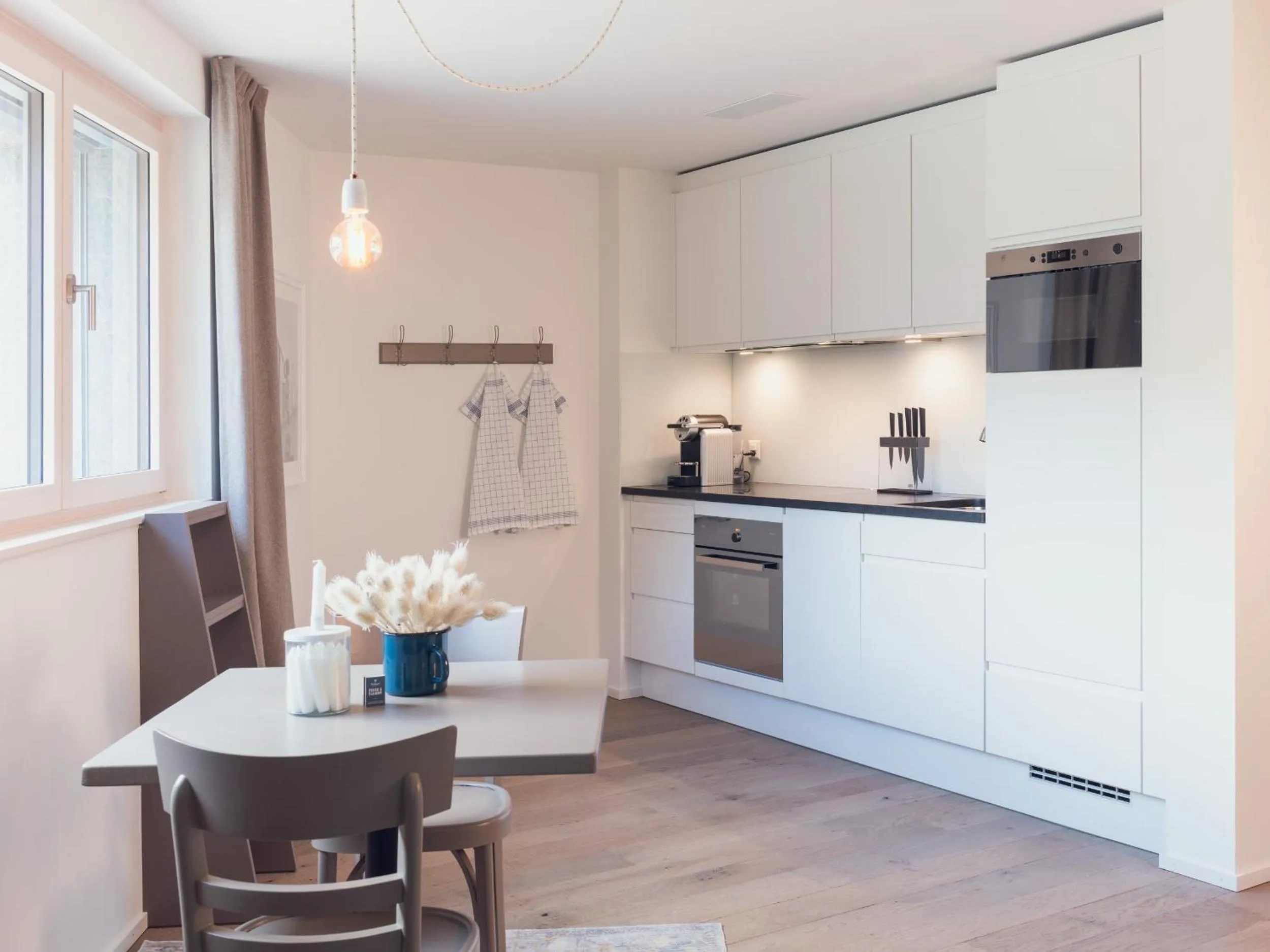 Kitchen or kitchenette in OVERLOOK Lodge by CERVO Zermatt