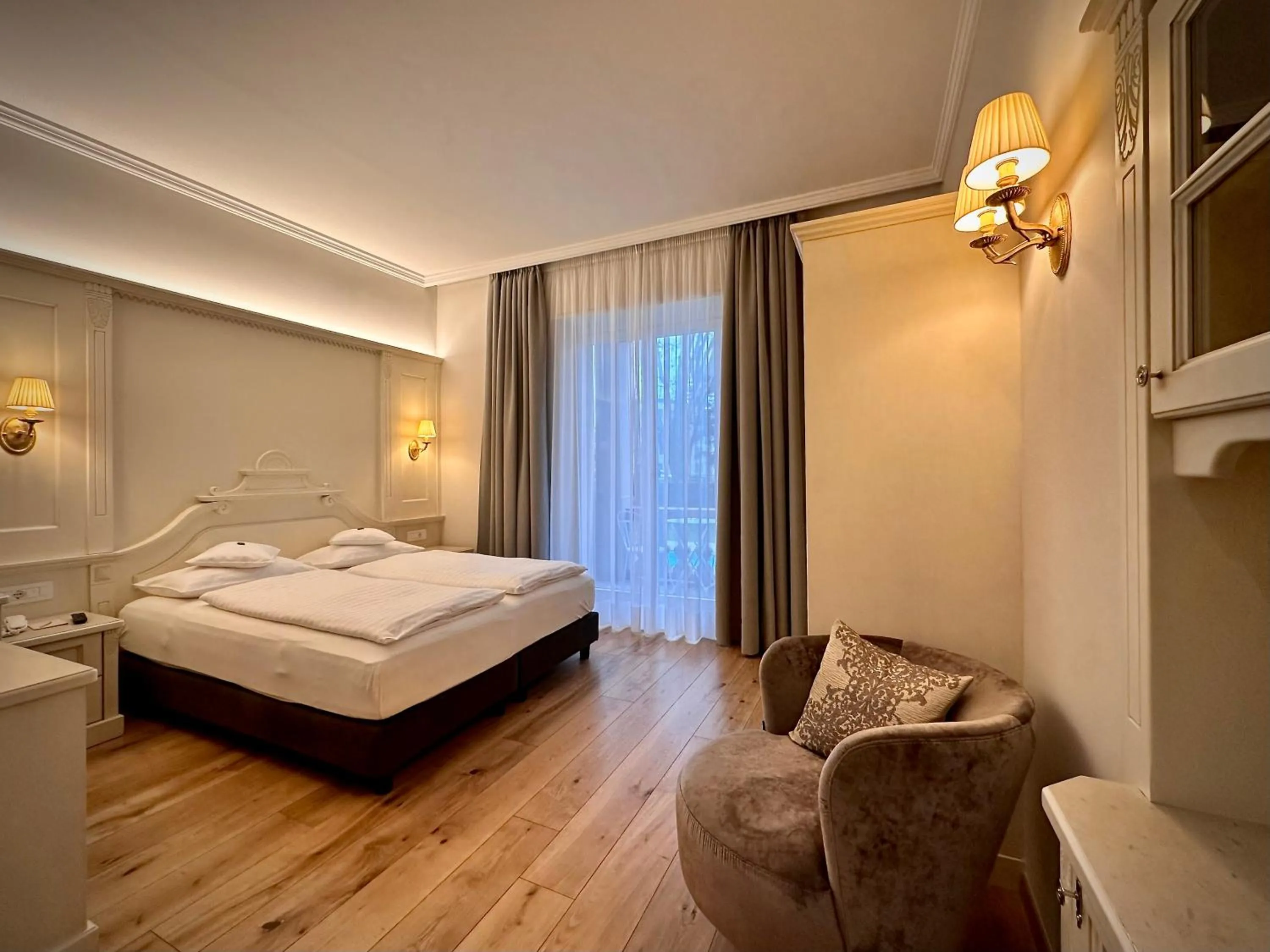 Bed in Windsor Merano Hotel & Suites