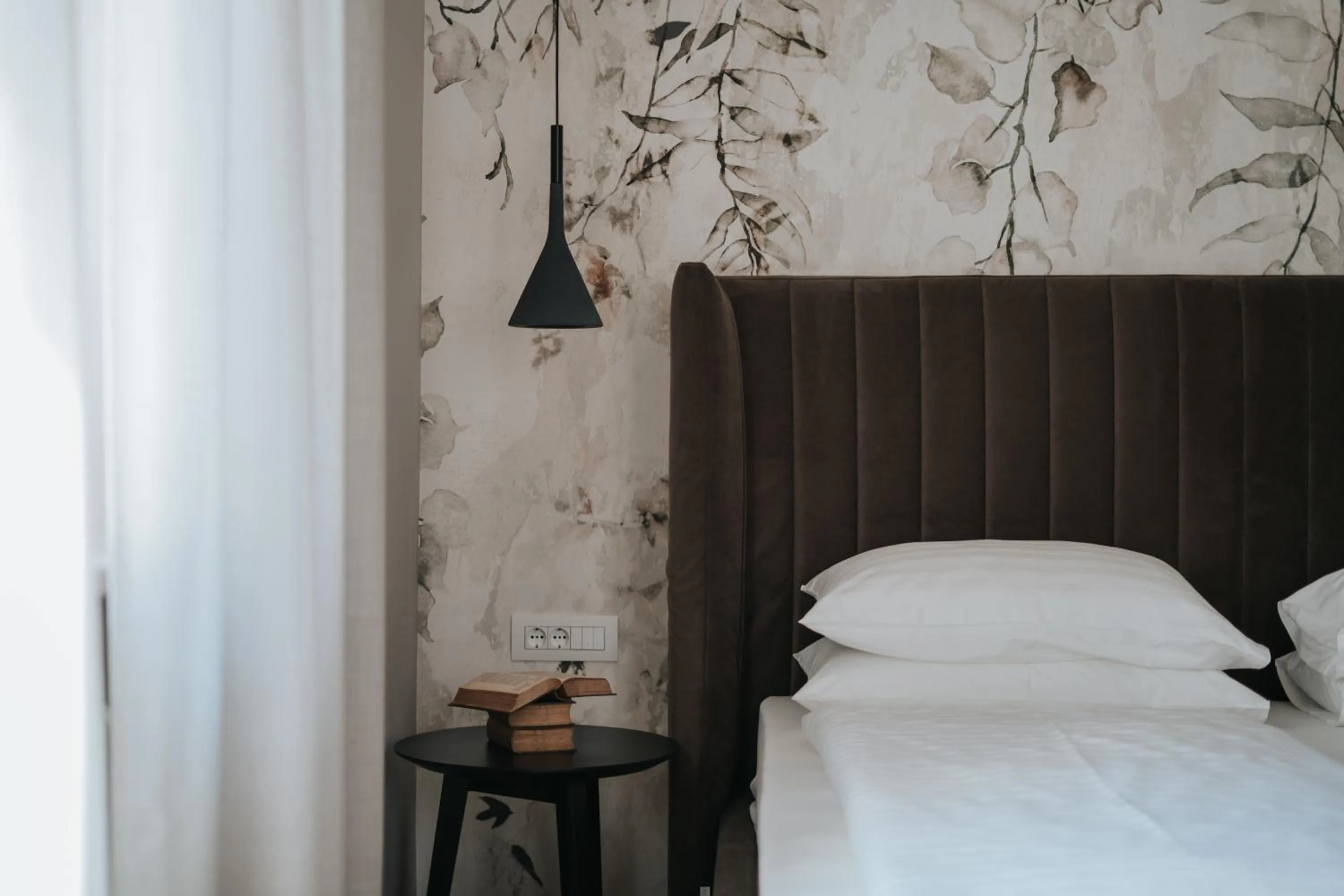 Bed in Windsor Merano Hotel & Suites