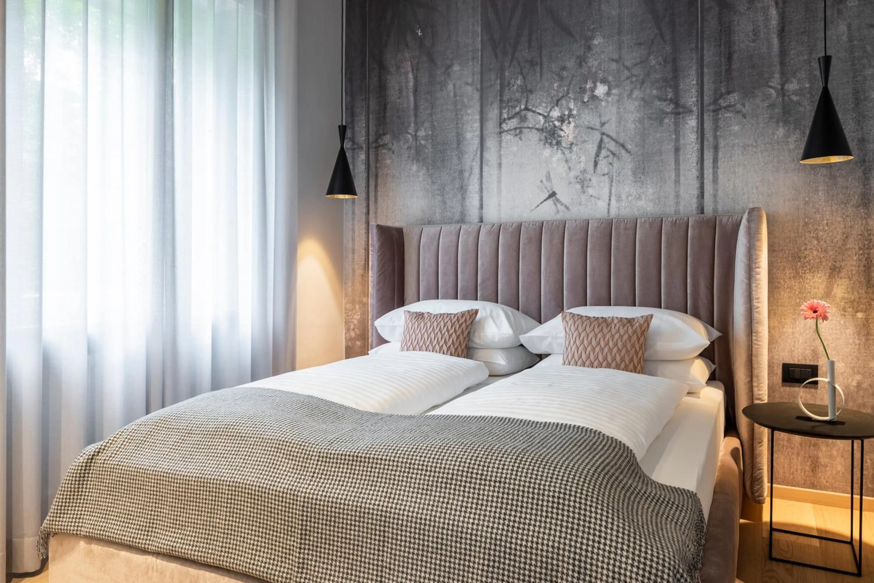 Bed in Windsor Merano Hotel & Suites