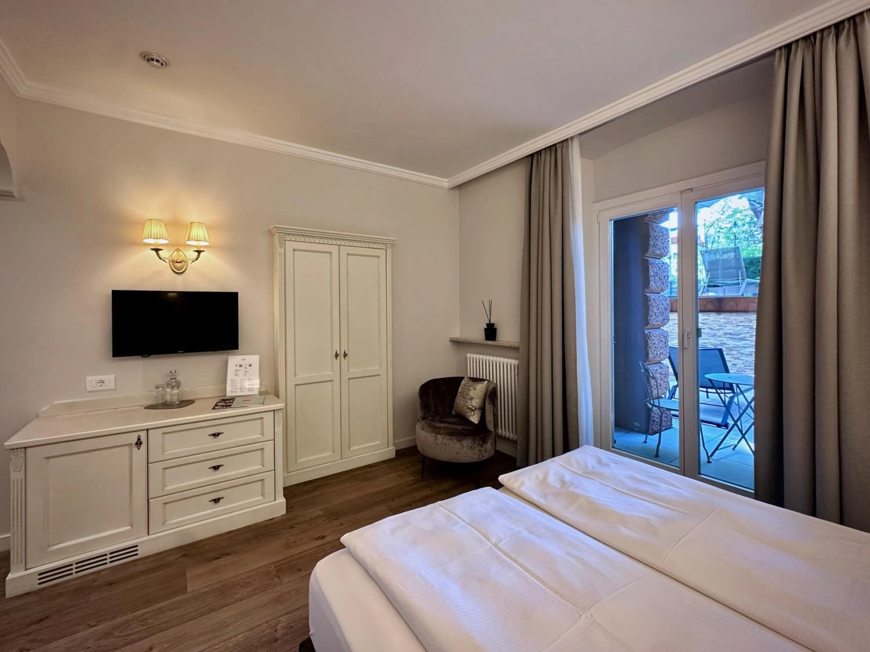 Bed in Windsor Merano Hotel & Suites