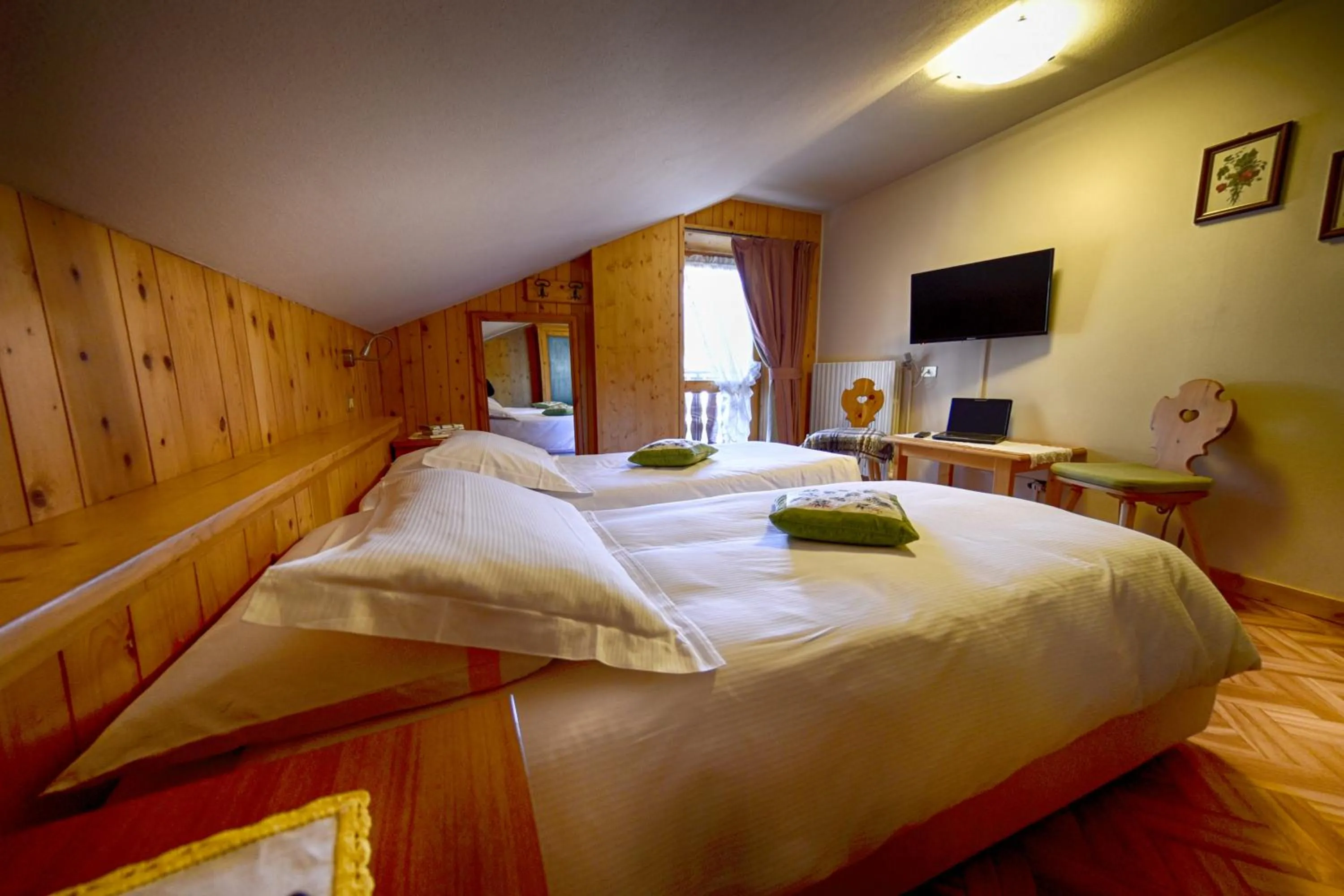 Bed in Meublè Cima Bianca Garni