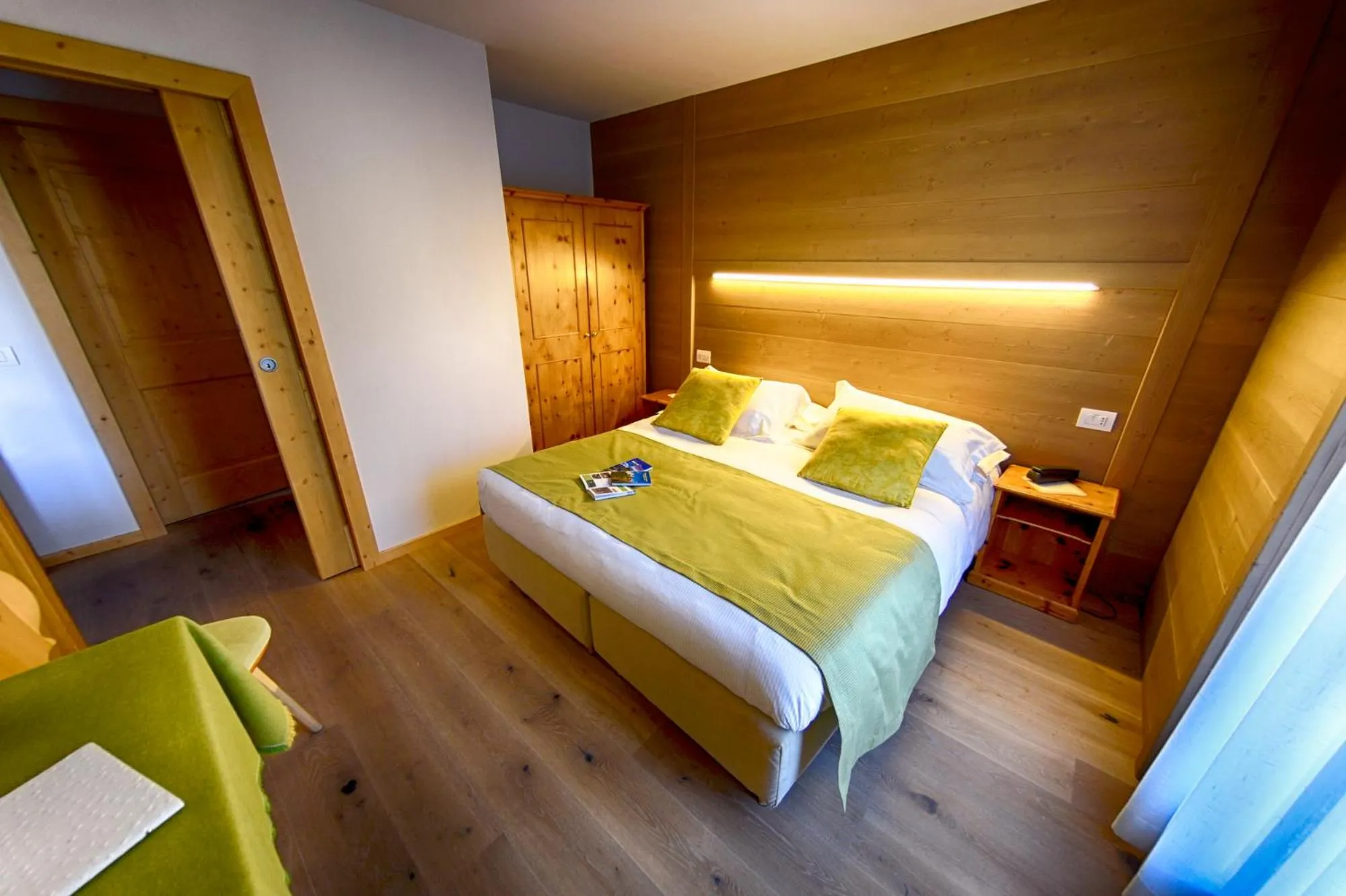 Bed in Meublè Cima Bianca Garni