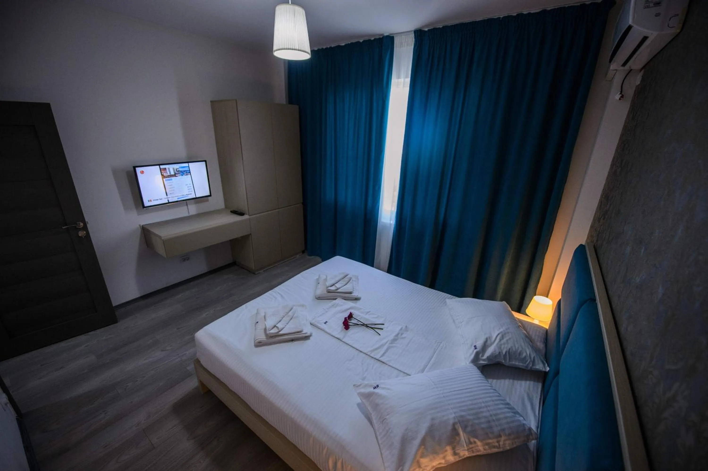 Photo of the whole room, Bed in Magnum Residence