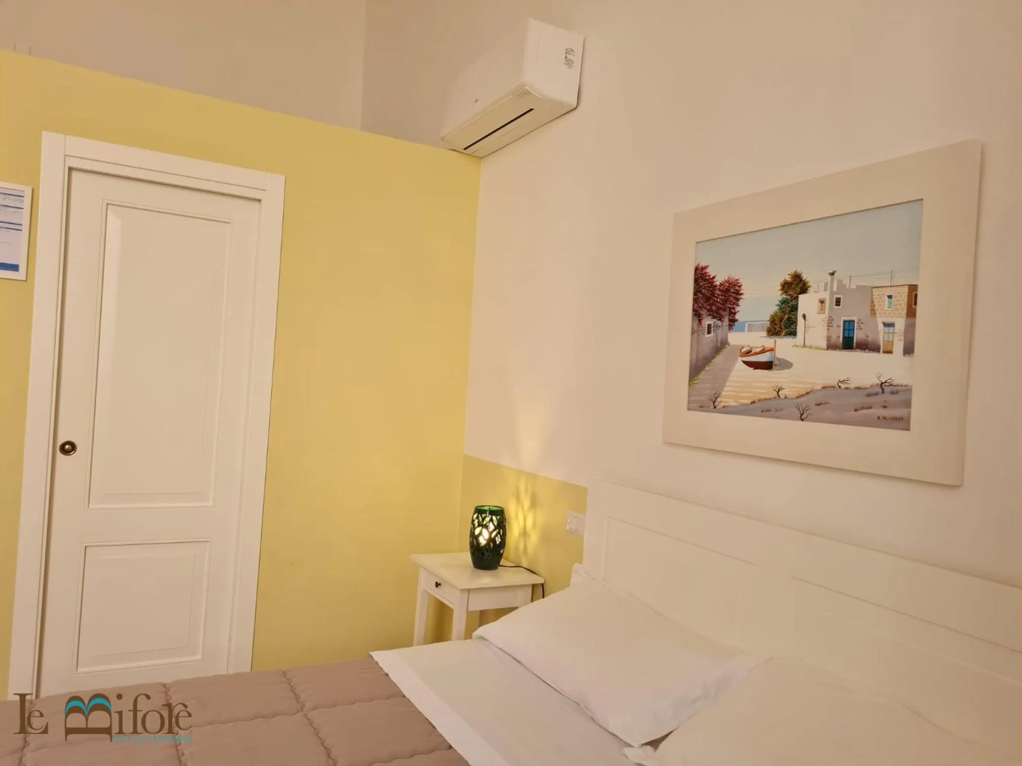 Bed in Le Bifore B&B