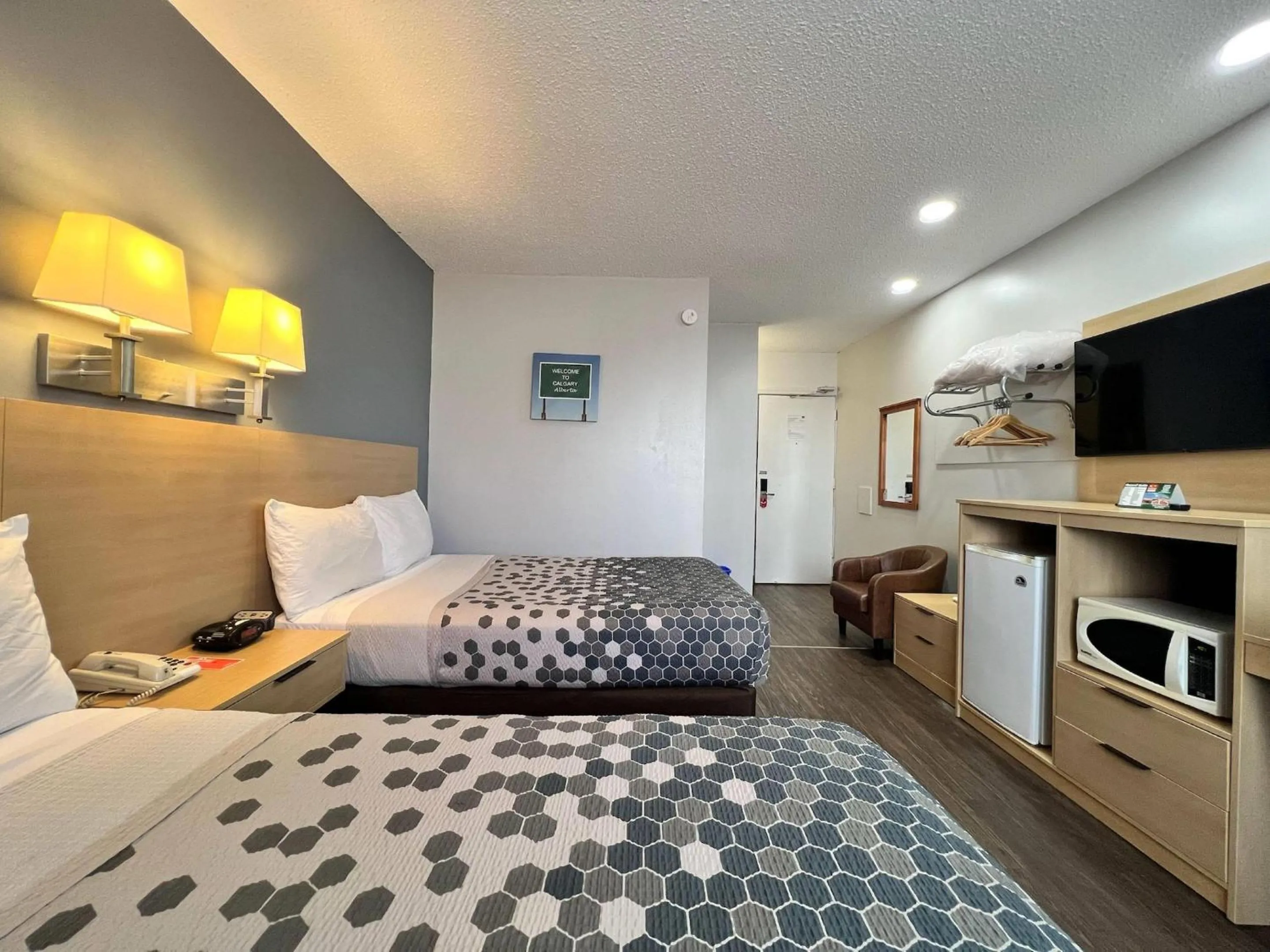 Bedroom, Bed in Econo Lodge Motel Village