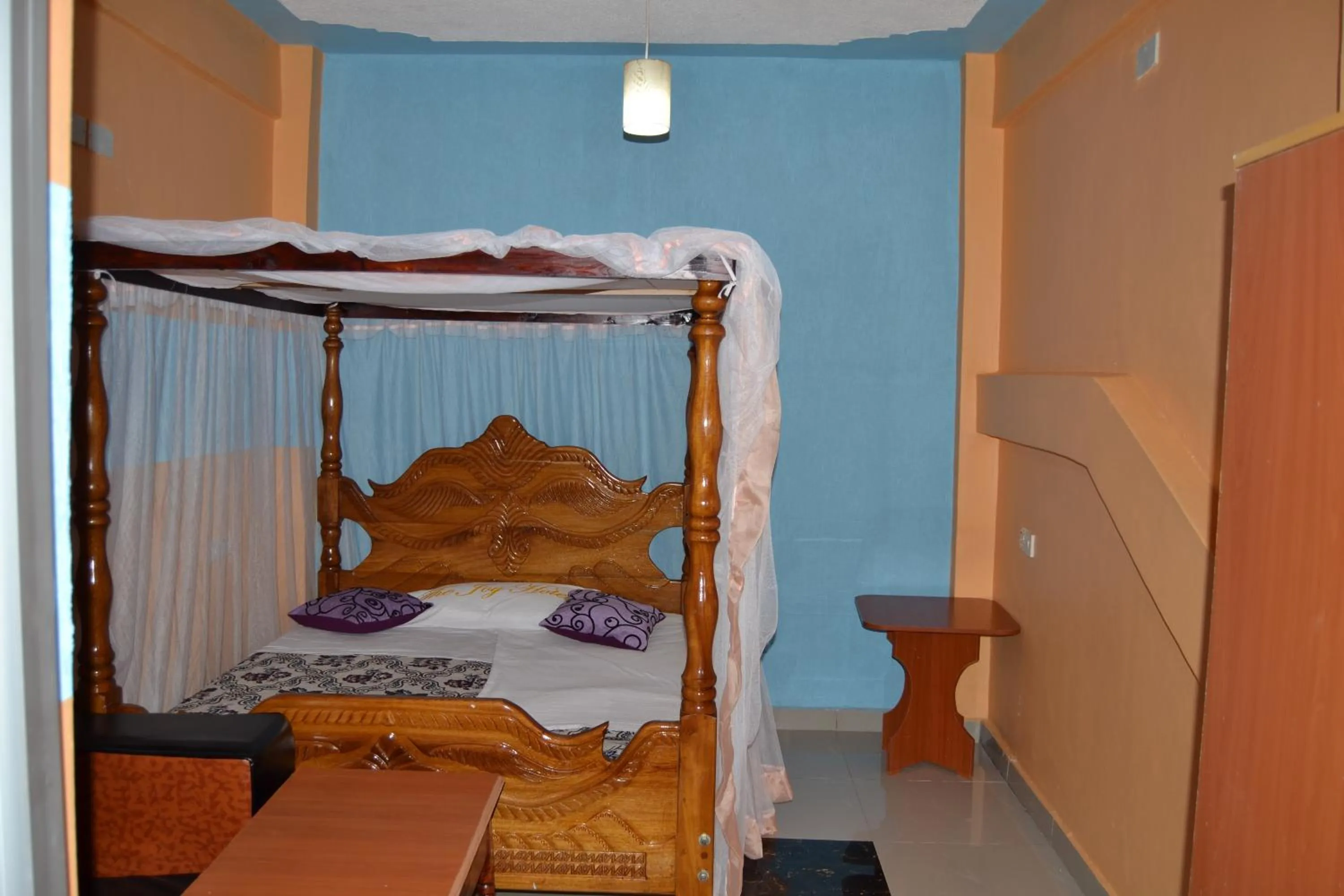 Bed in The Joy Hotel