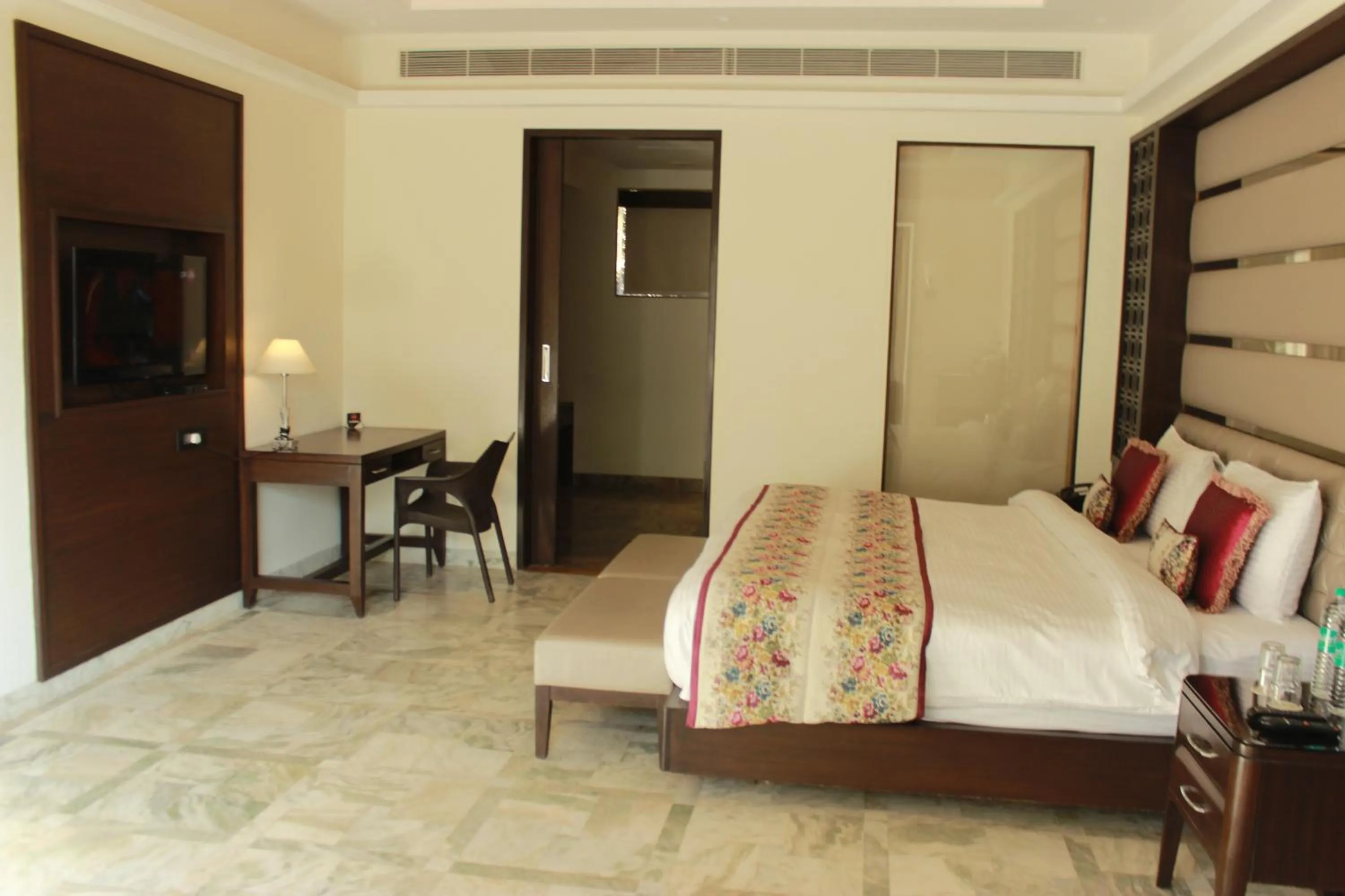 Bed in Ramya Resort & Spa